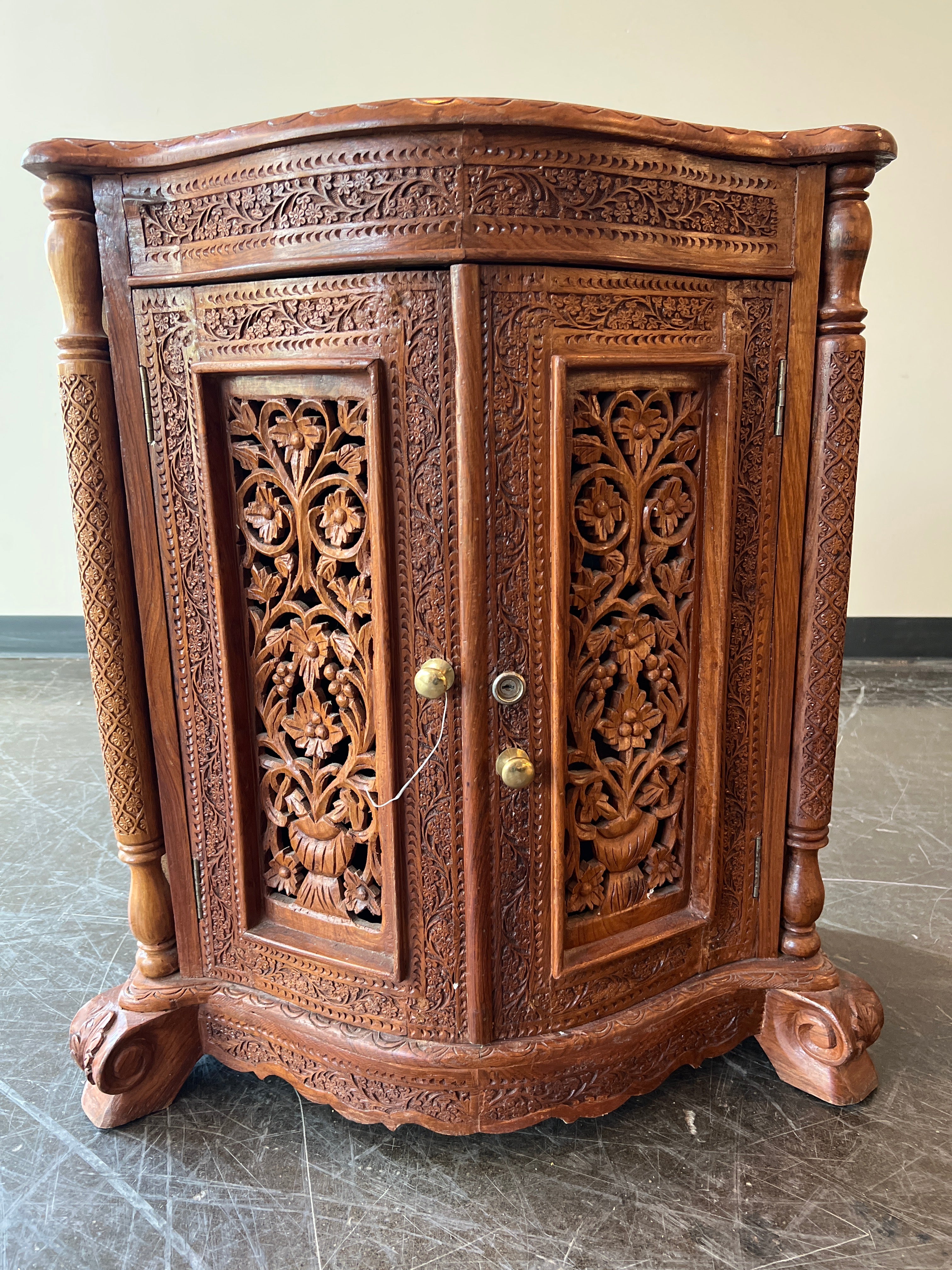 Intricate Carved Wood Corner Cabinet