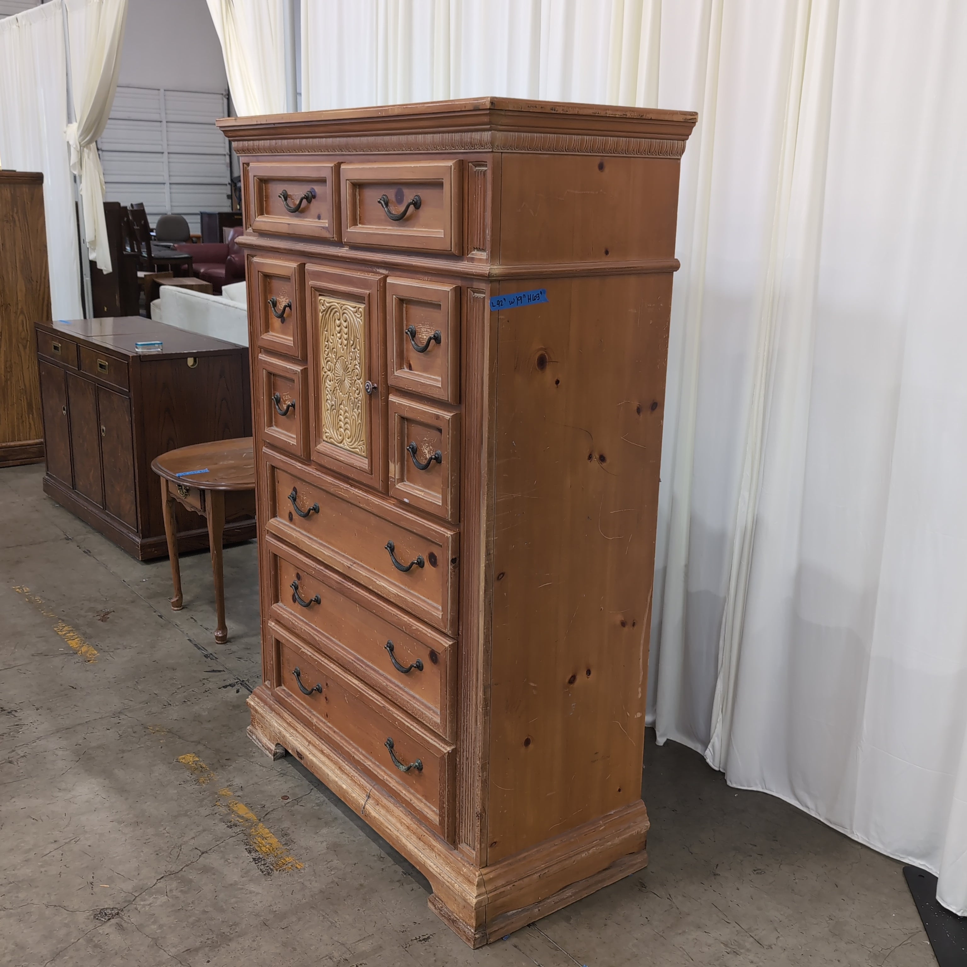 Traditional Carved Wood Dresser with Decorative Panel