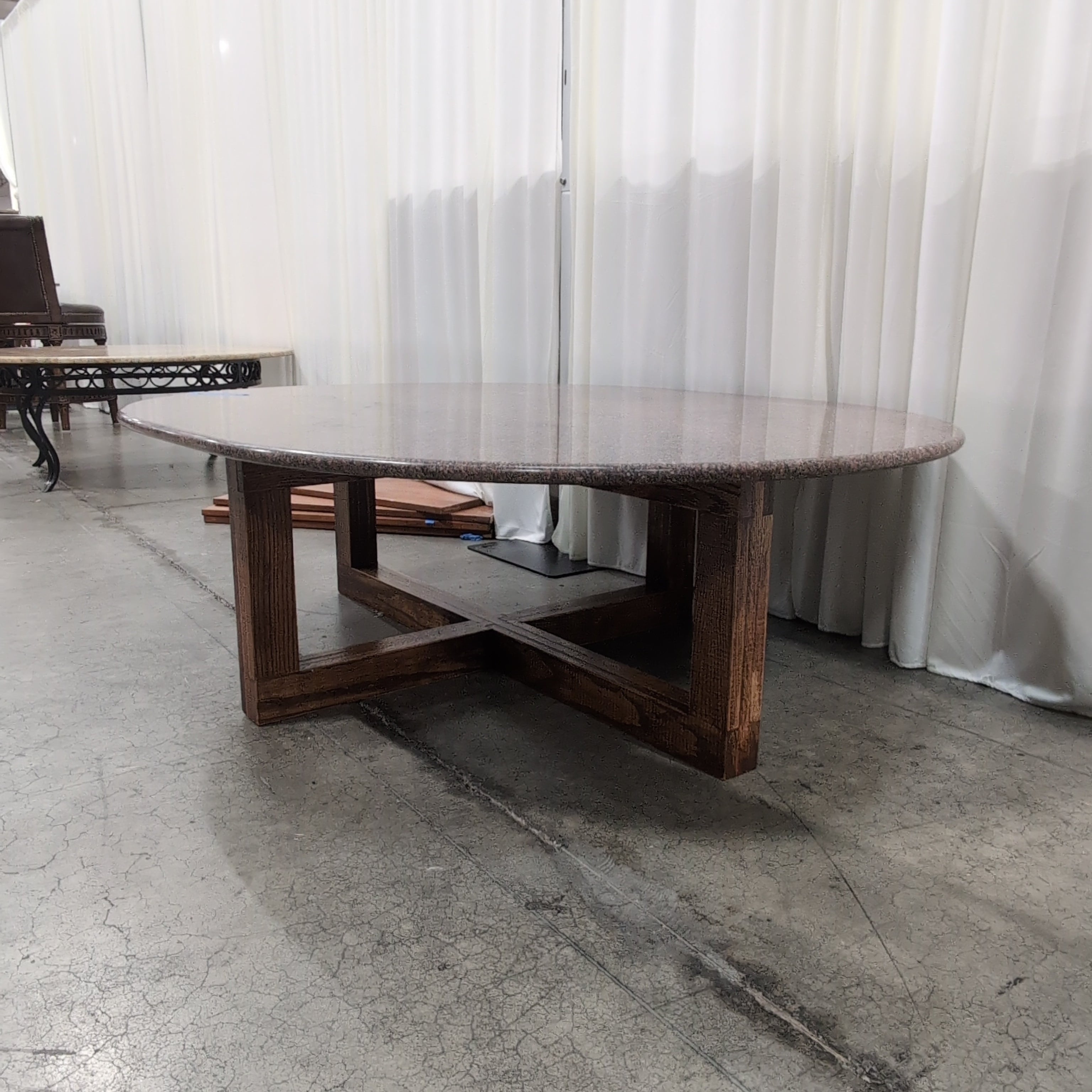 Round Light Granite Dining Table with Scrolled Iron Base