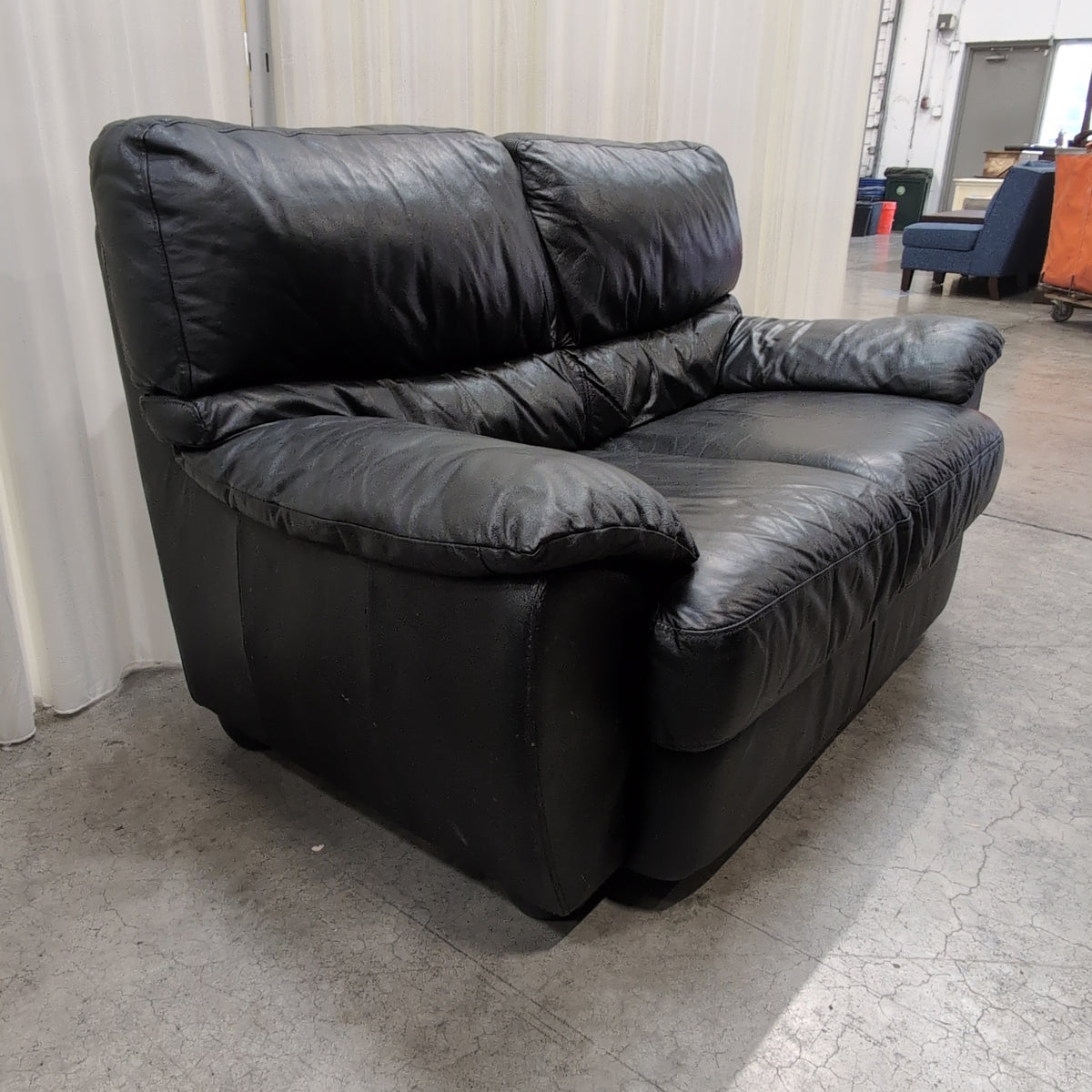 Black Leather Three-Seat Couch with Padded Arms