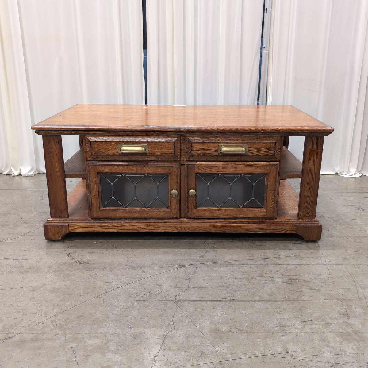 Brown Wood Coffee Table with Patterned Glass Doors