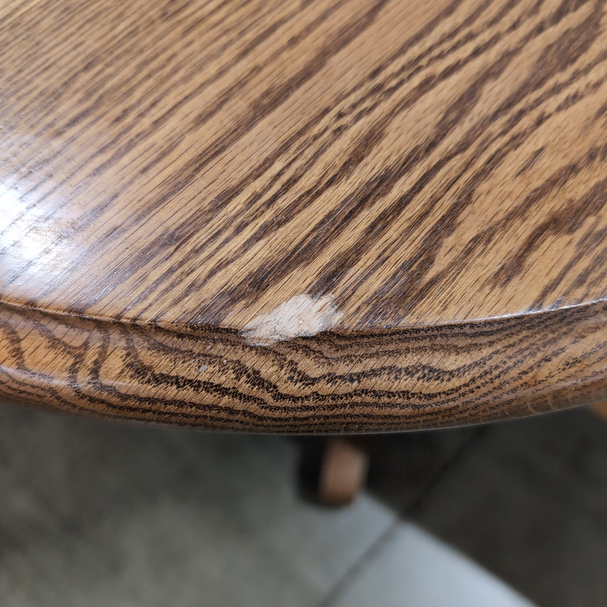 Reddish Brown Oval Pedestal Dining Table