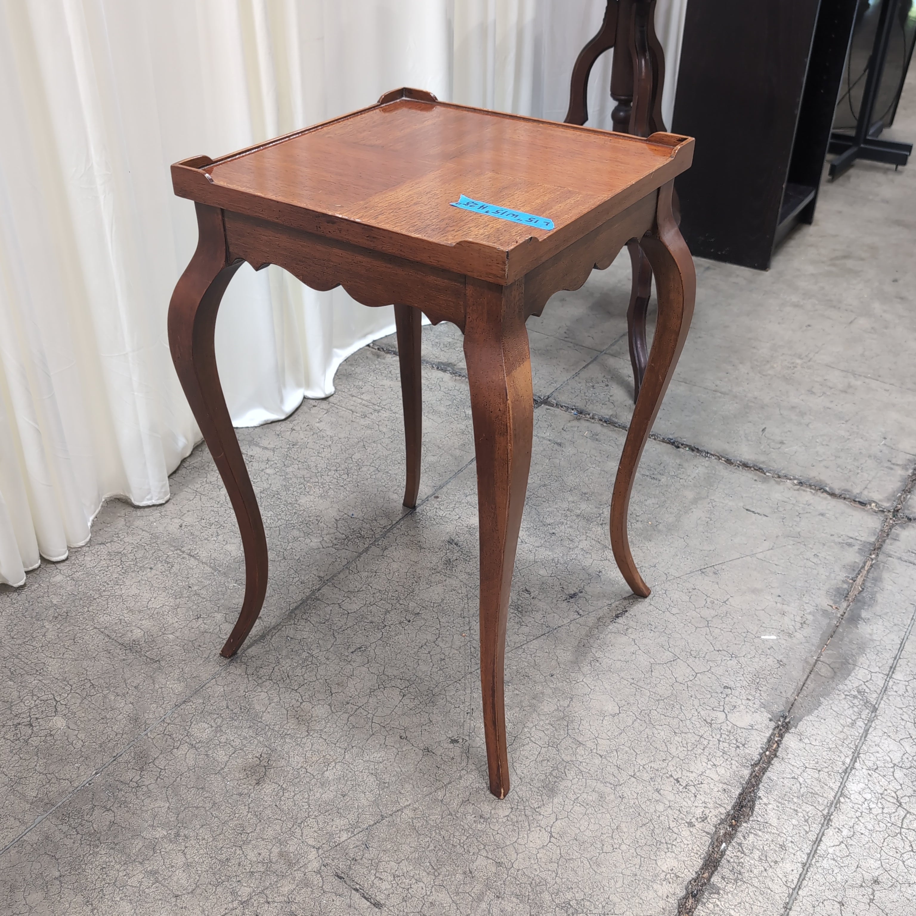 Dark Wood Scalloped End Table with Curved Legs