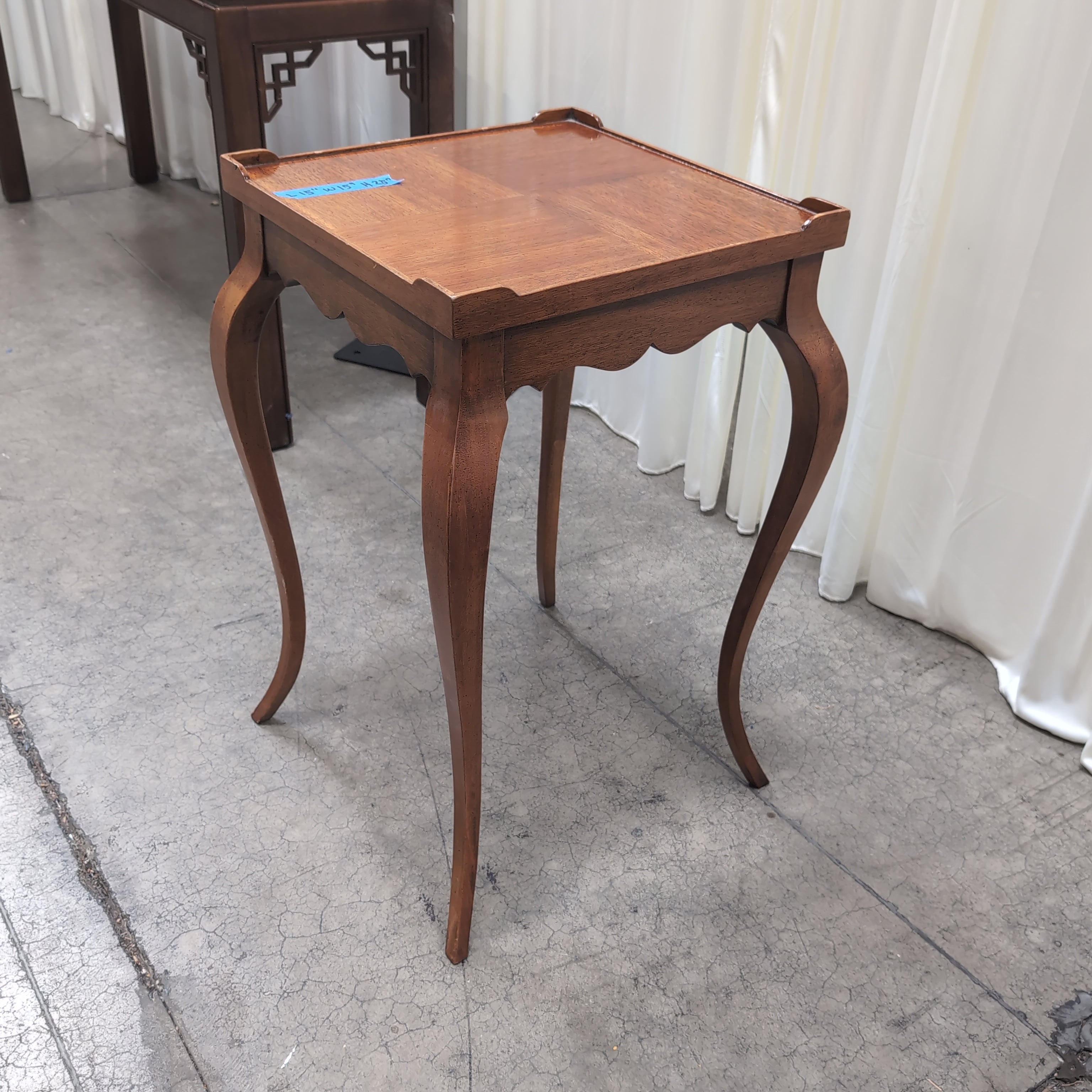 Dark Wood Scalloped End Table with Curved Legs