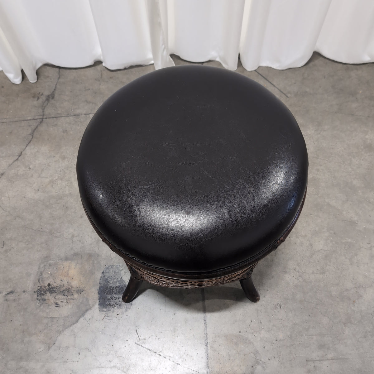 Round Woven Rattan Ottoman with Dark Upholstery