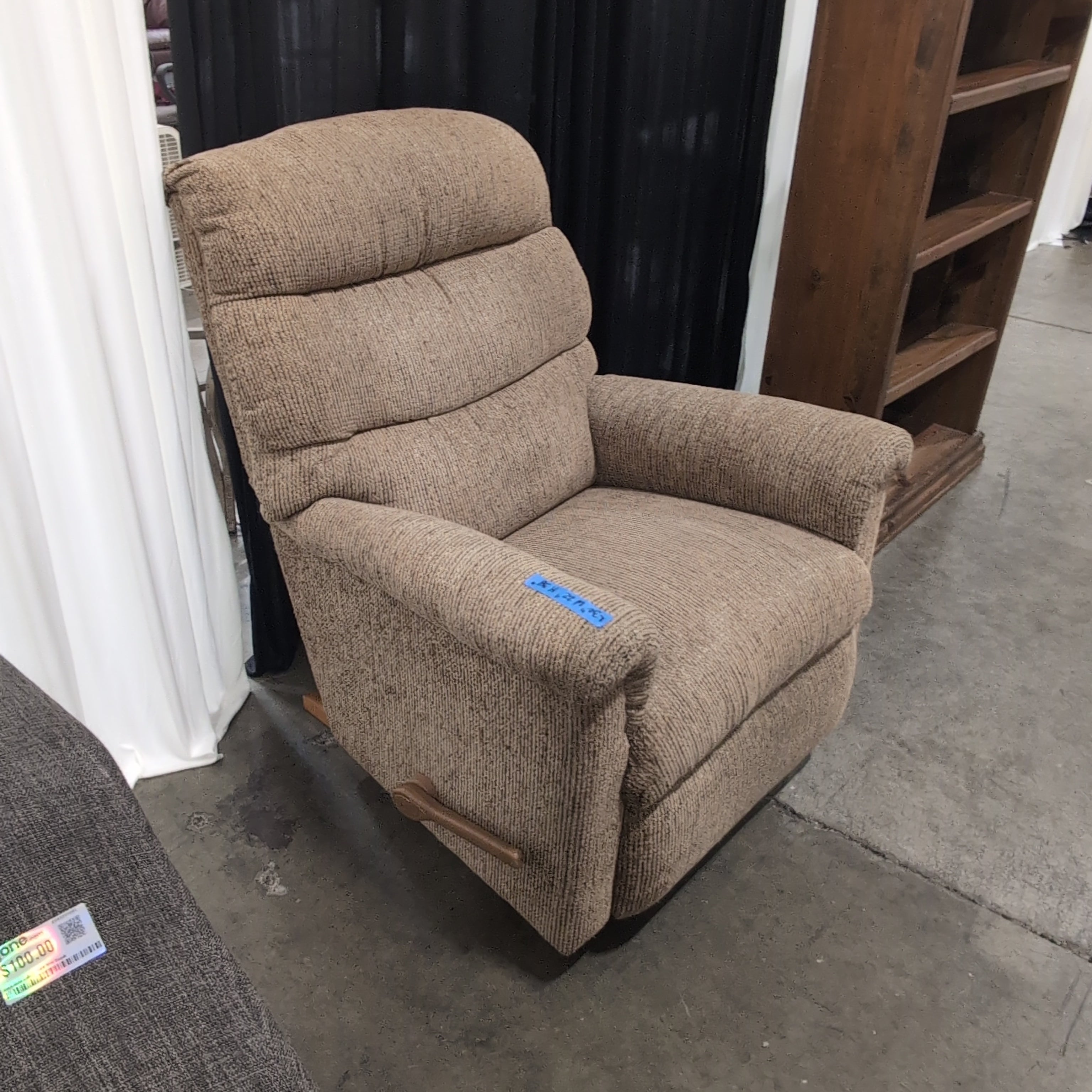 Tan Textured Fabric Recliner with Rolled Arms