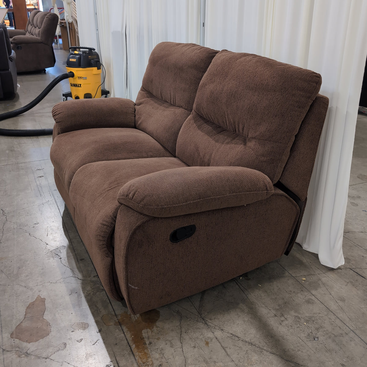 Brown Textured Fabric Reclining Loveseat with Padded Arms