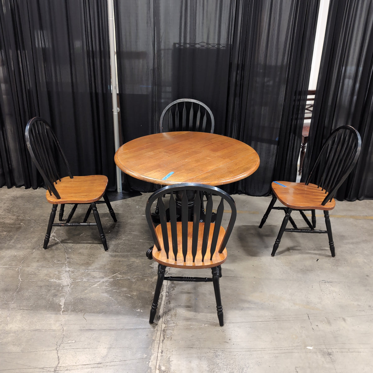 Two-Tone Round Dining Table with Windsor Chairs