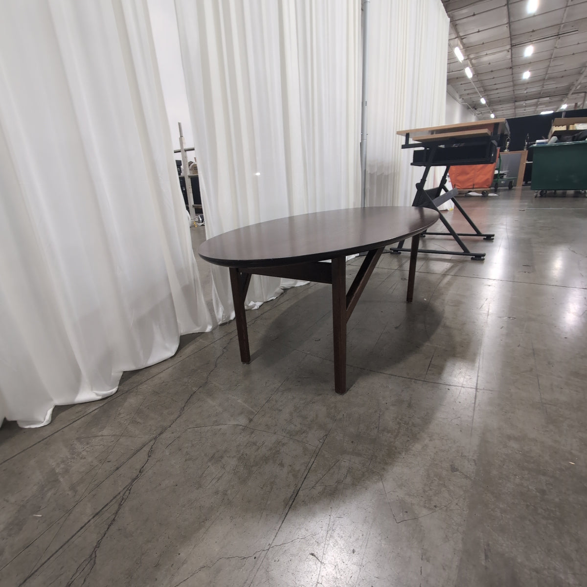 Oval Dark Wood Dining Table with Angled Legs