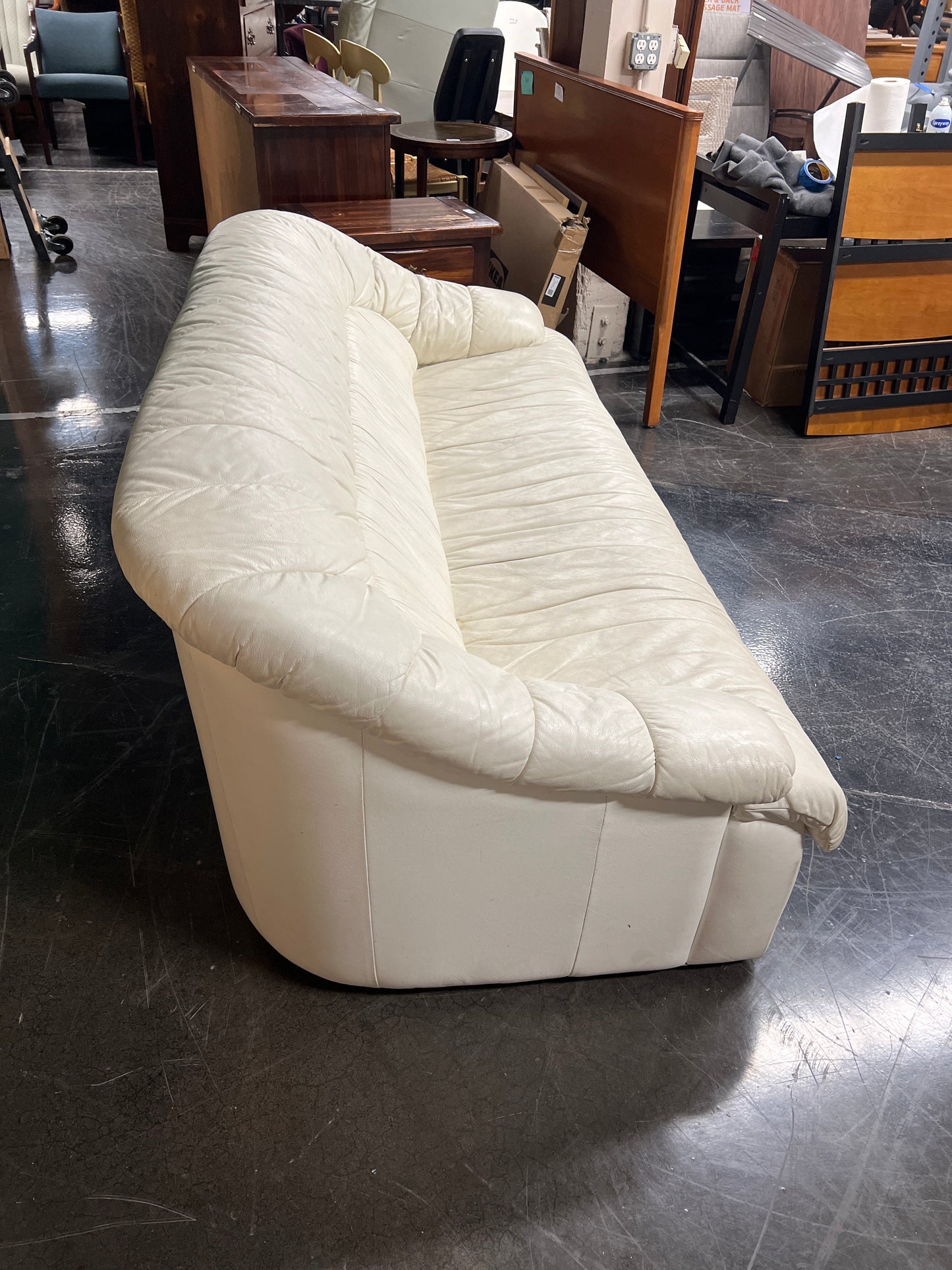 Cream-Colored Leather Sofa with Unique Design