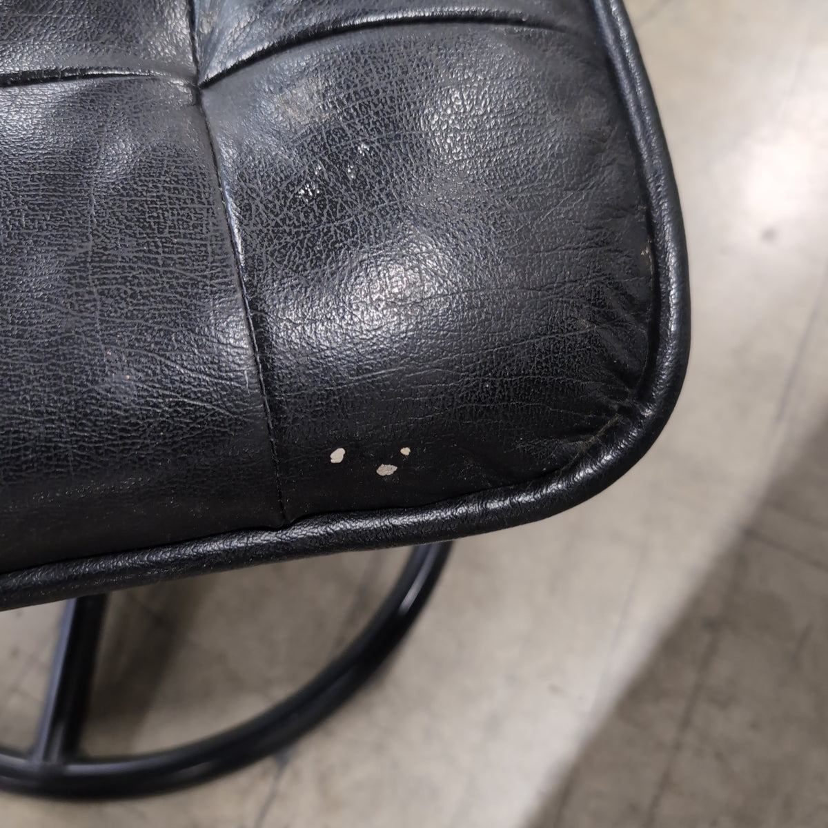Black Tufted Leather Swivel Recliner with Ottoman