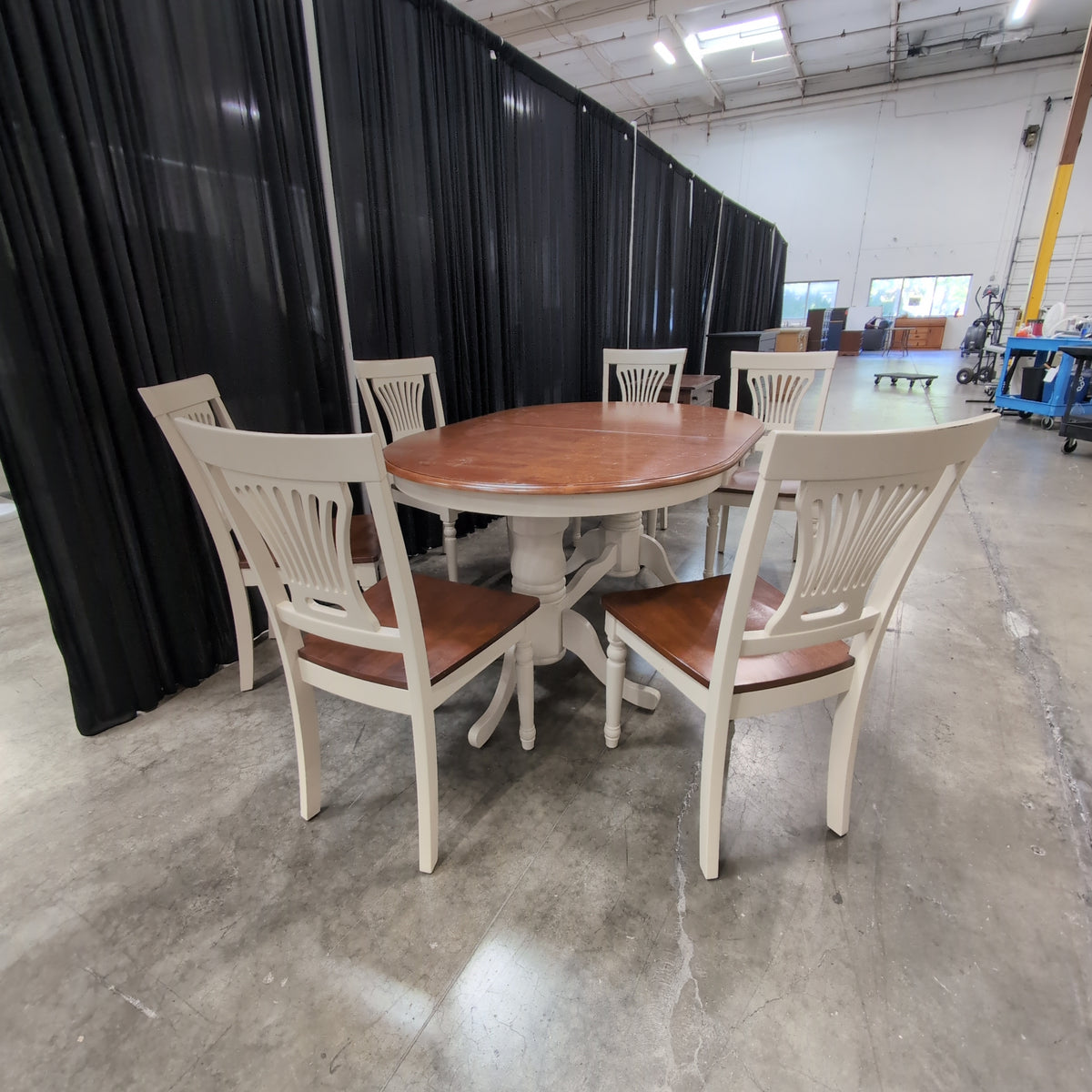 Two-Tone Extendable Dining Table with Pedestal Base