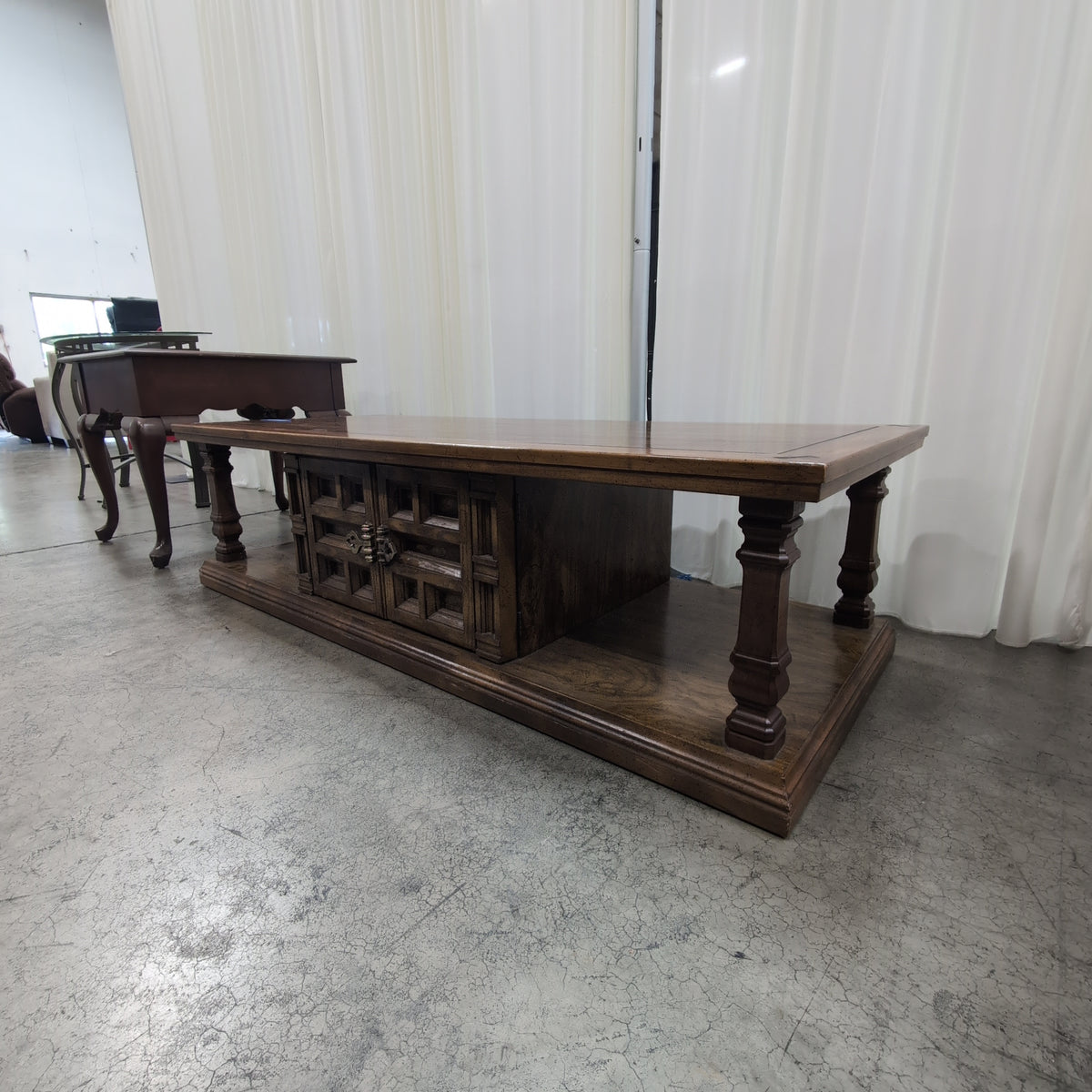Traditional Dark Wood Coffee Table with Carved Details