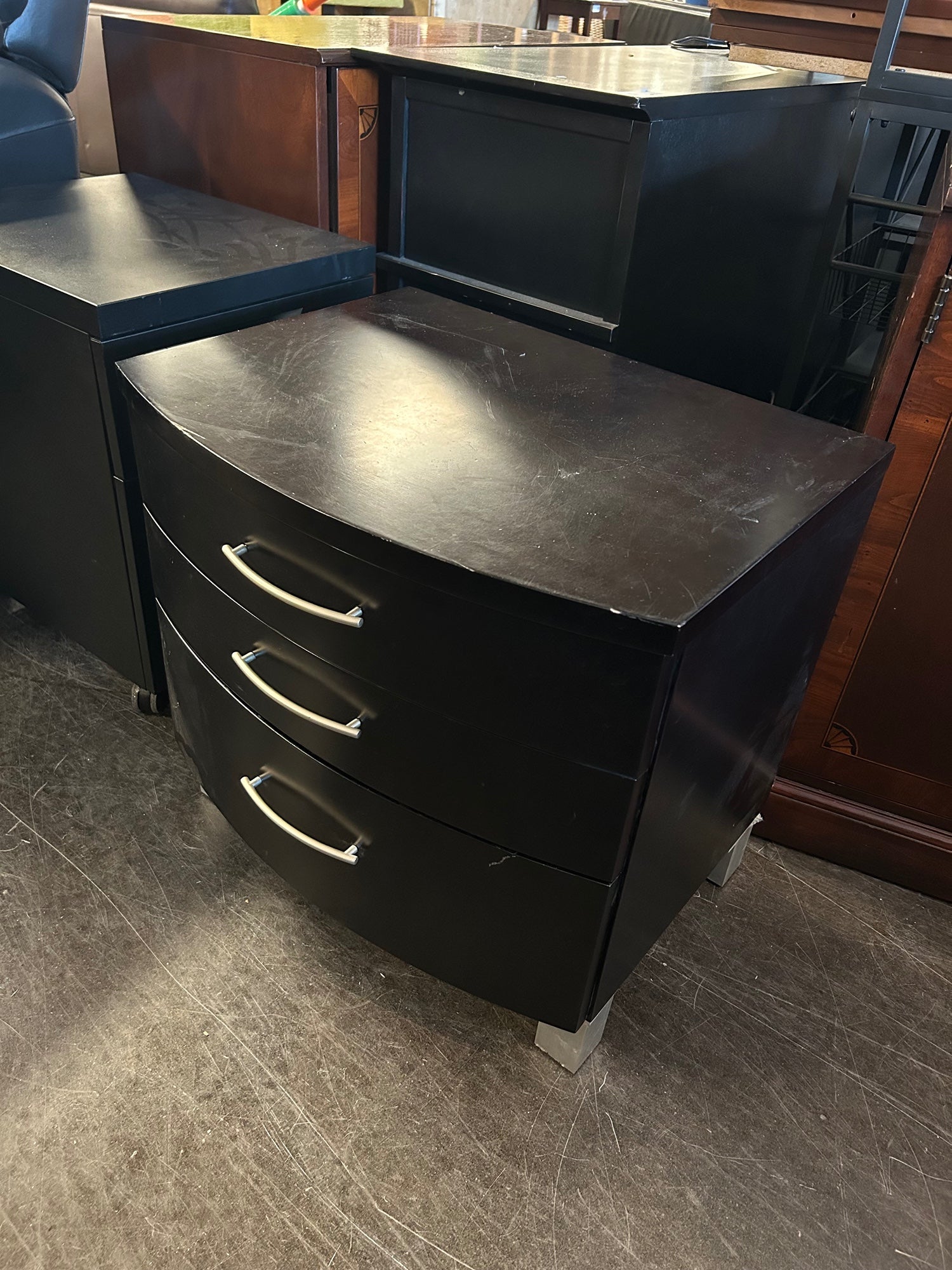 Curved Ebony Nightstand With SIlver Pulls