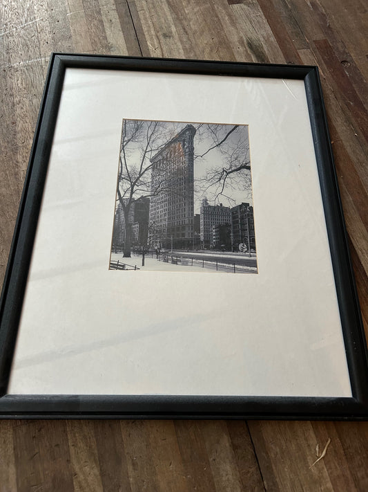 Black And White City Photo With Broken Corner on Frame