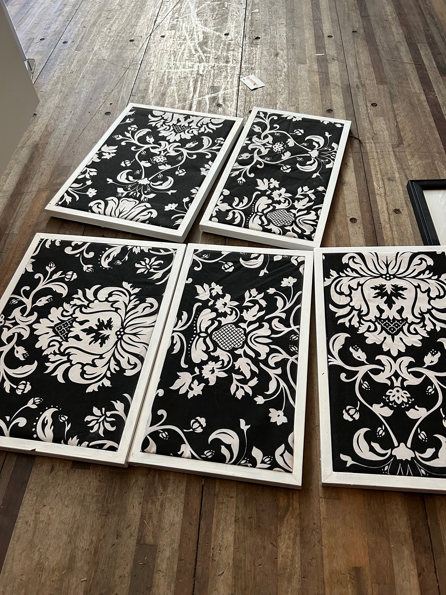 Frame Pieces of Black And White Fabric