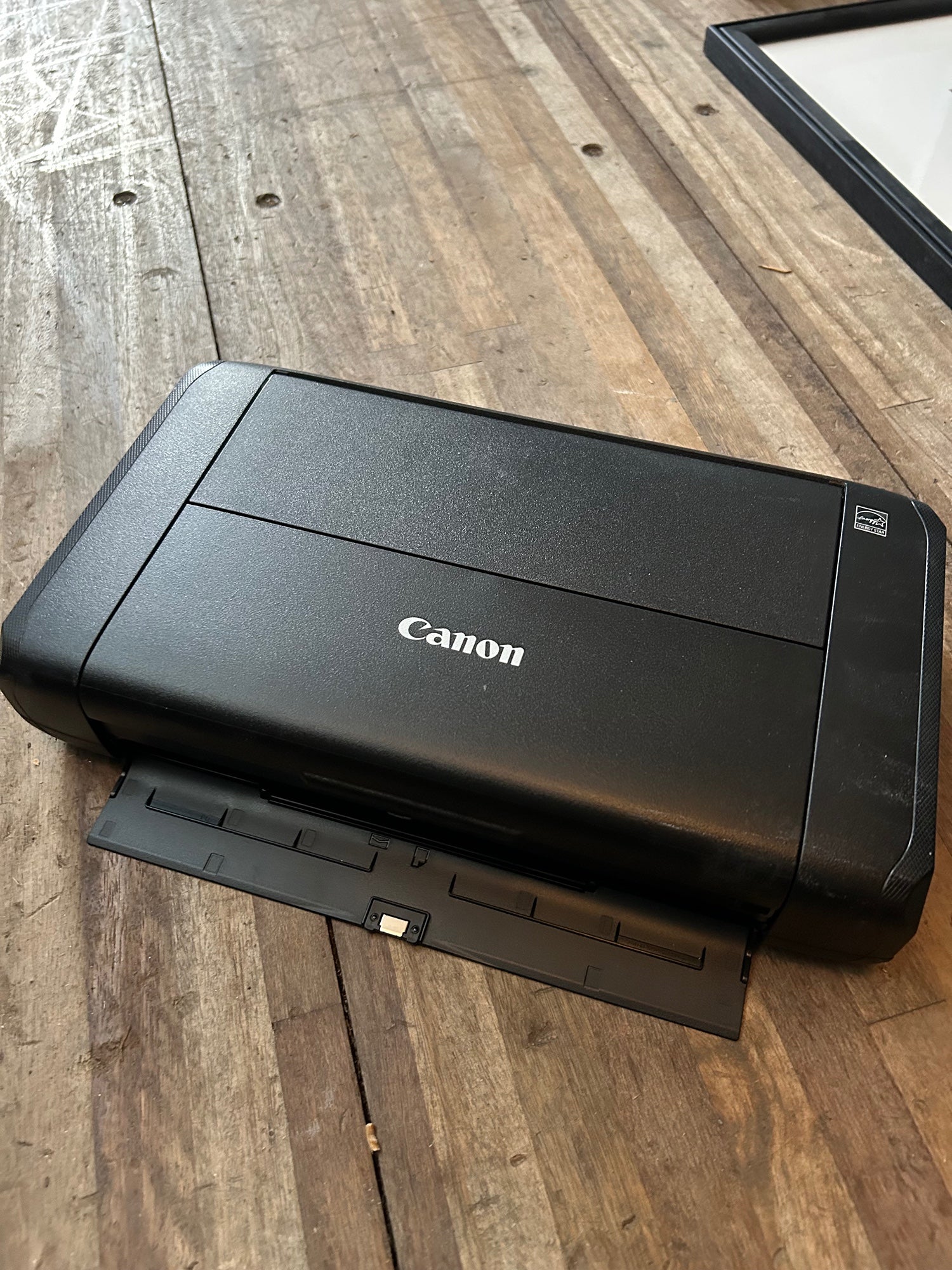 Black Canon PIXMA TR150 Wireless Portable Printer.