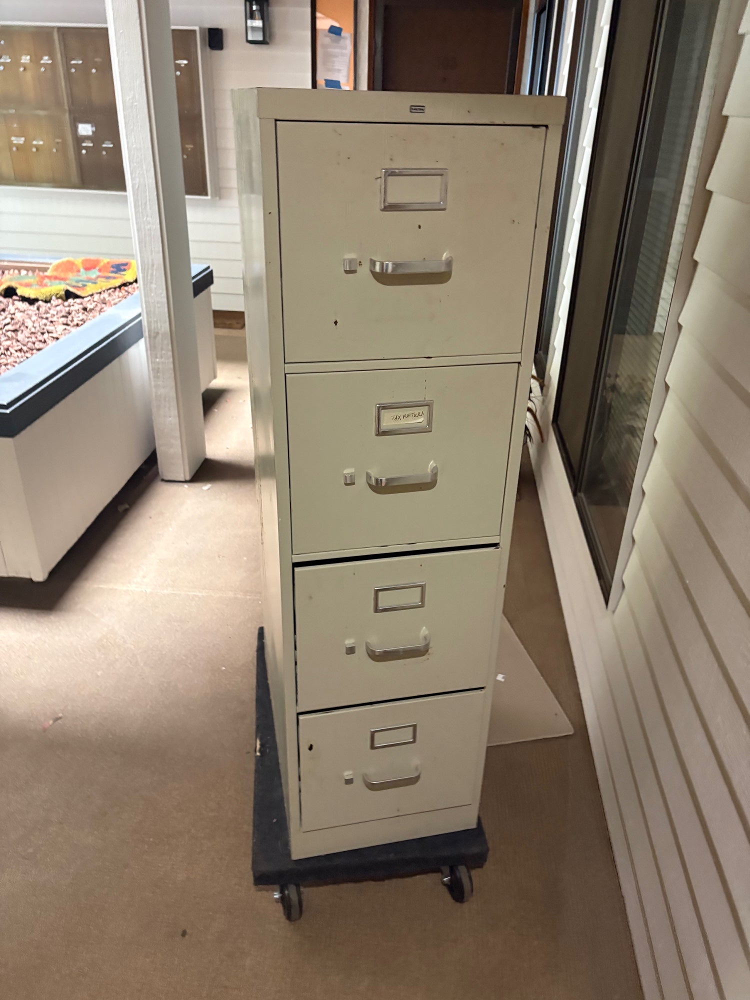 Four-Drawer Beige Metal Filing Cabinet