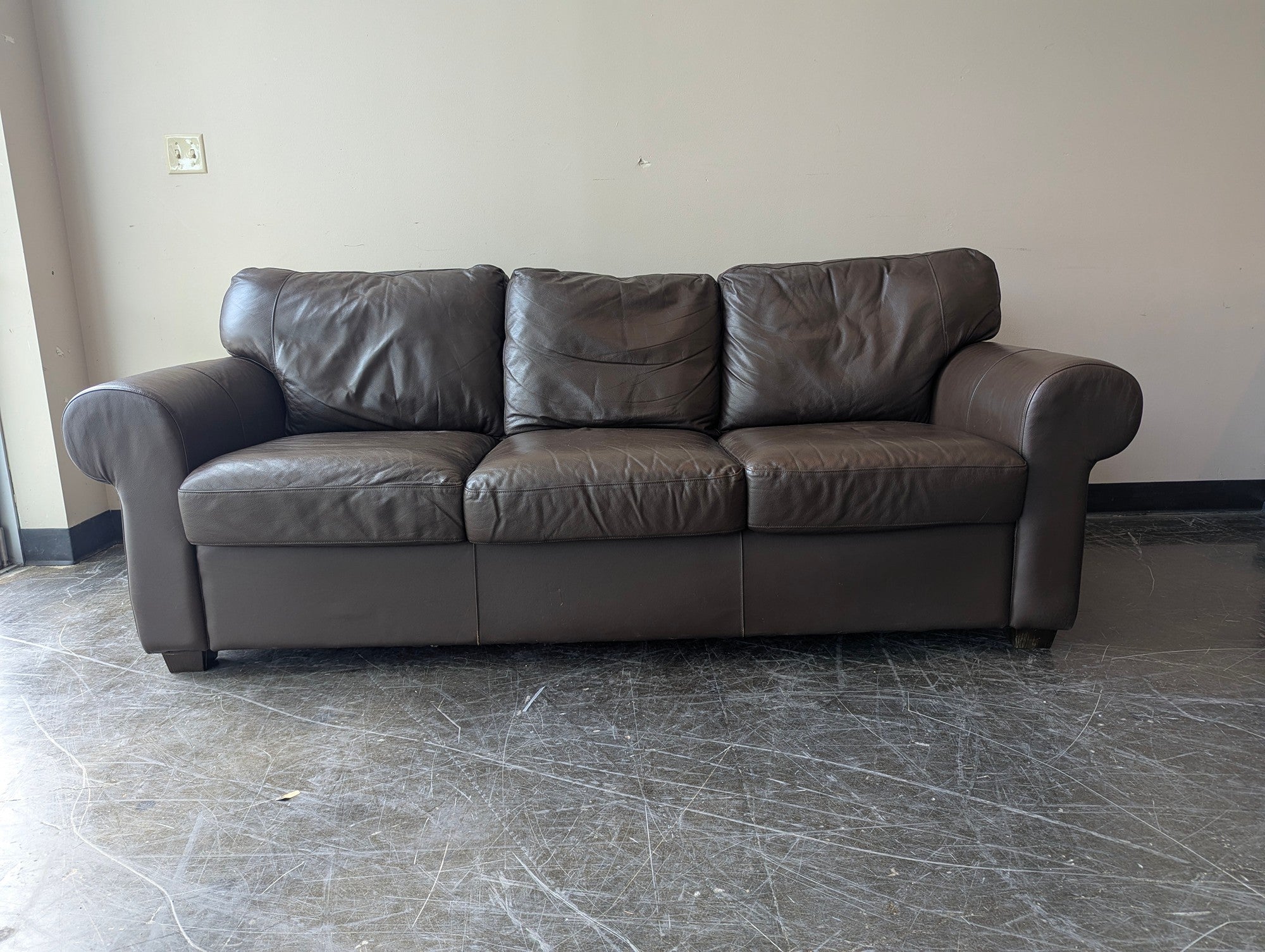 Brown Three Seater couch