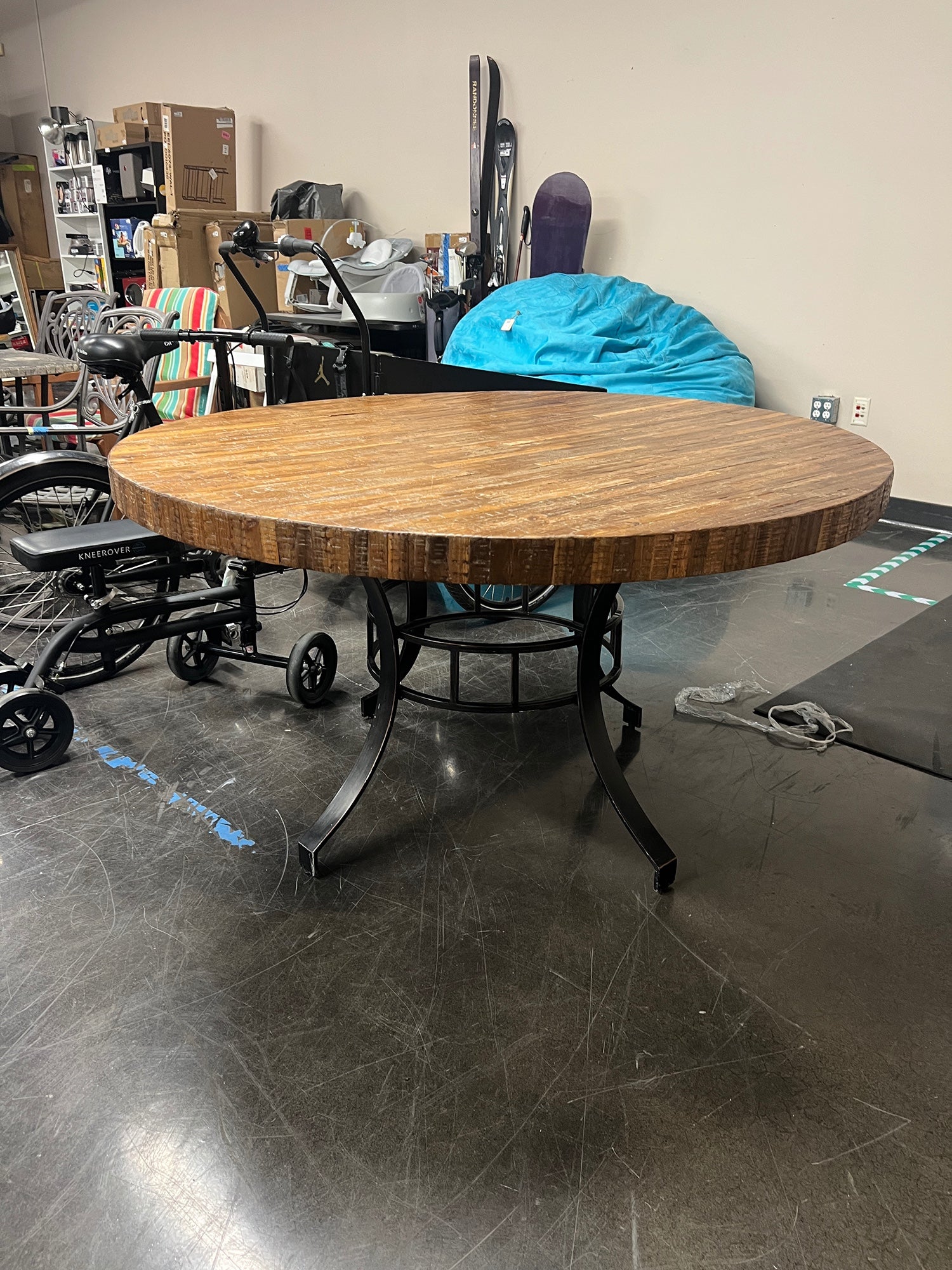 Rustic Round Wood Plank Dining Table with Industrial Metal Base