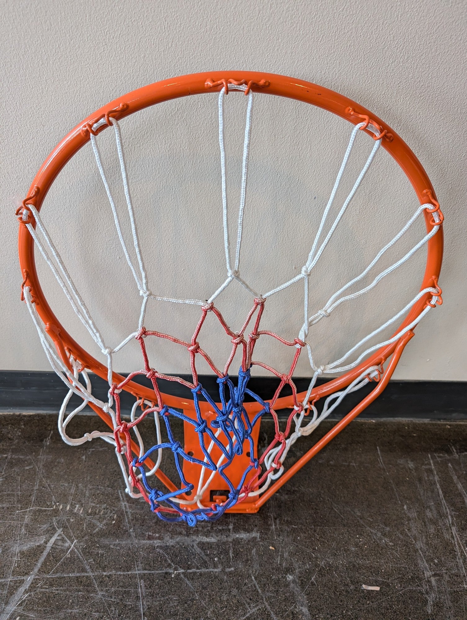 Vibrant Orange Basketball Hoop with Patriotic Net