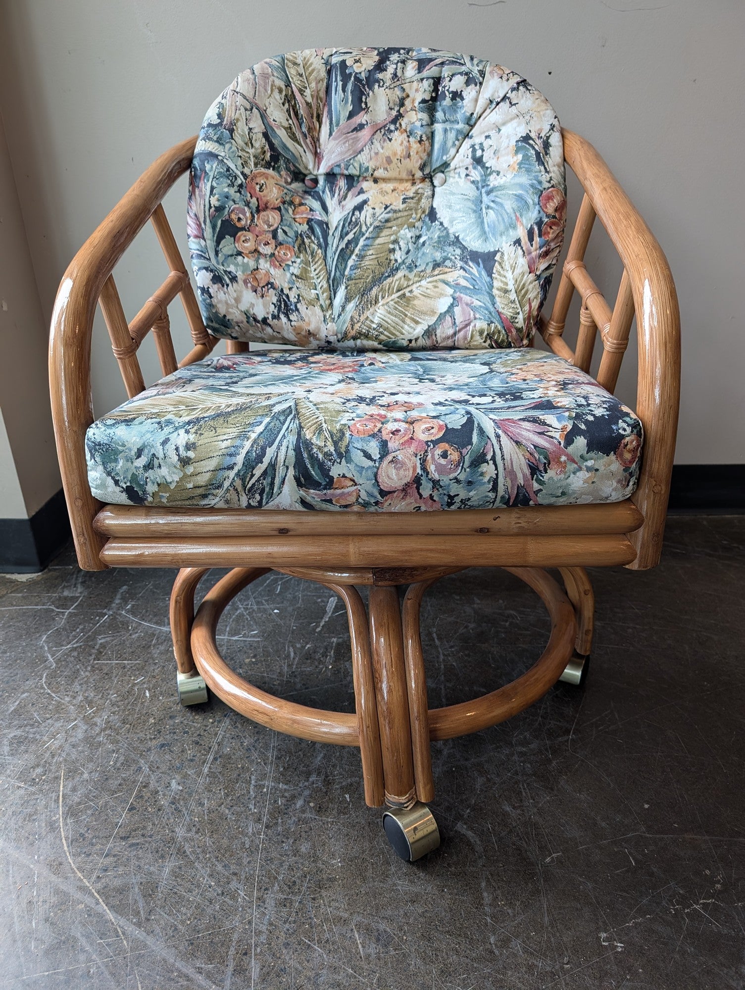 Vintage Rattan Swivel Caster Chair with Tropical Floral Cushions