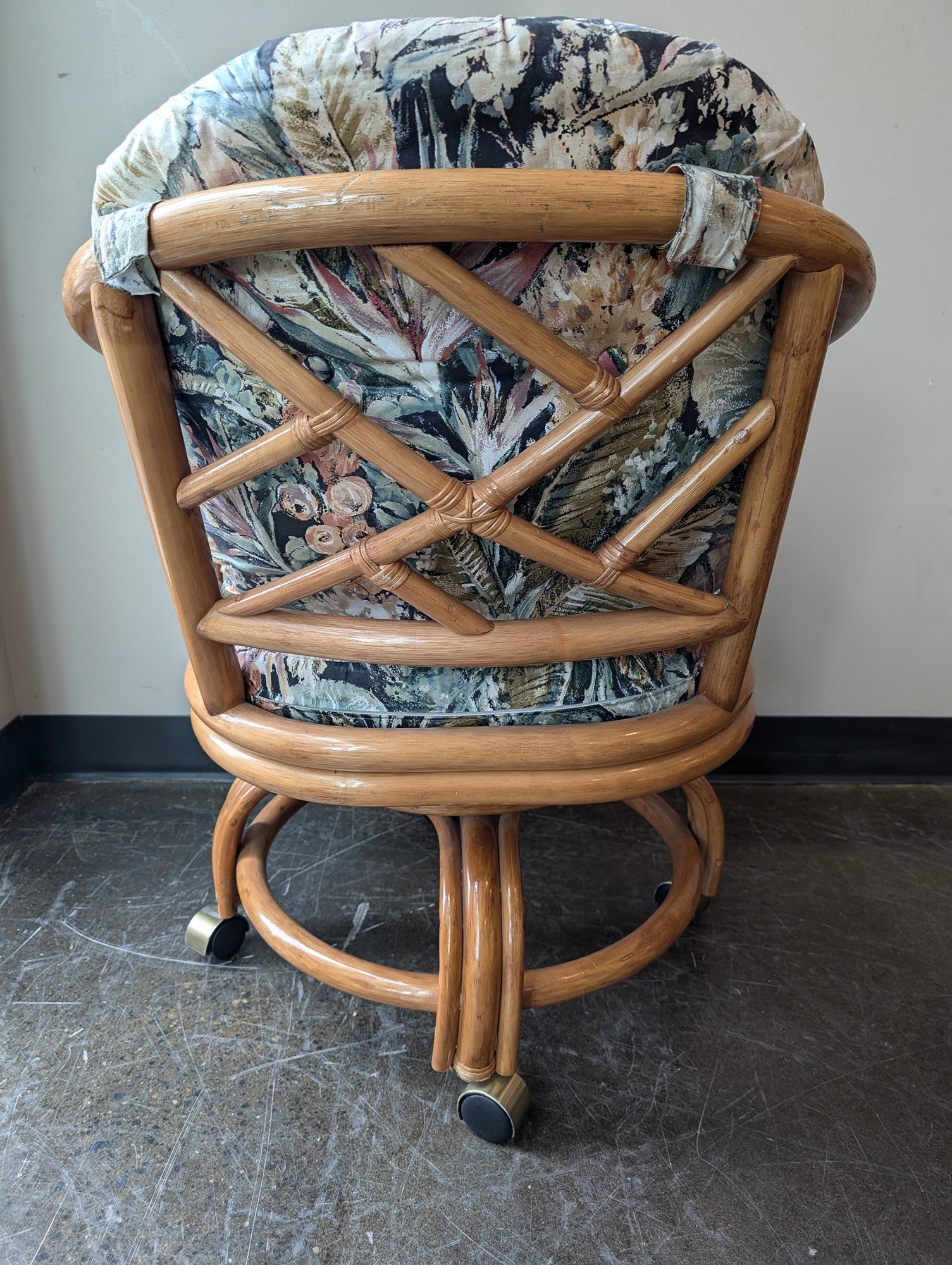 Vintage Rattan Swivel Caster Chair with Tropical Floral Cushions