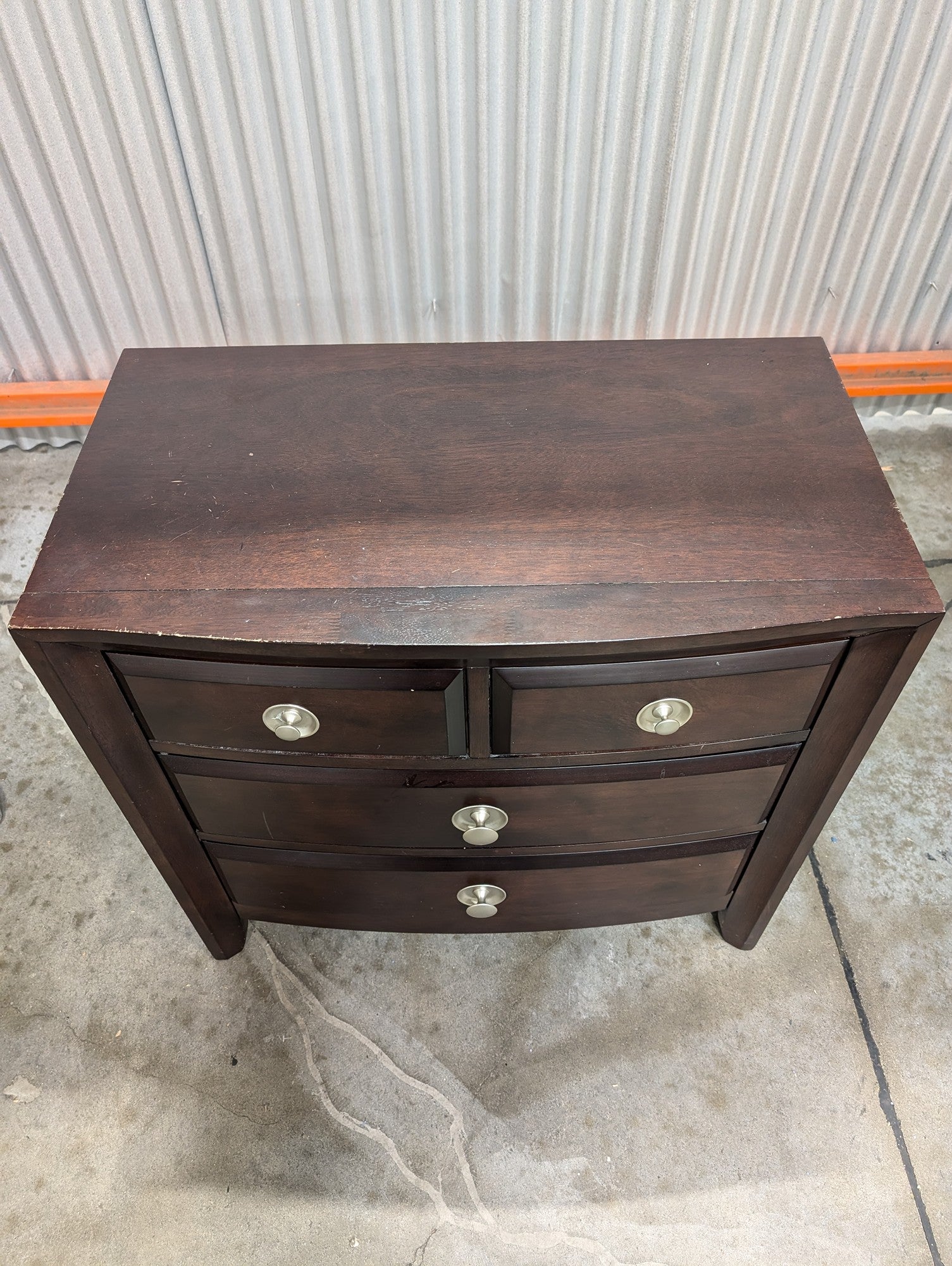 Rich Brown Wood Nightstand with Curved Drawer Fronts