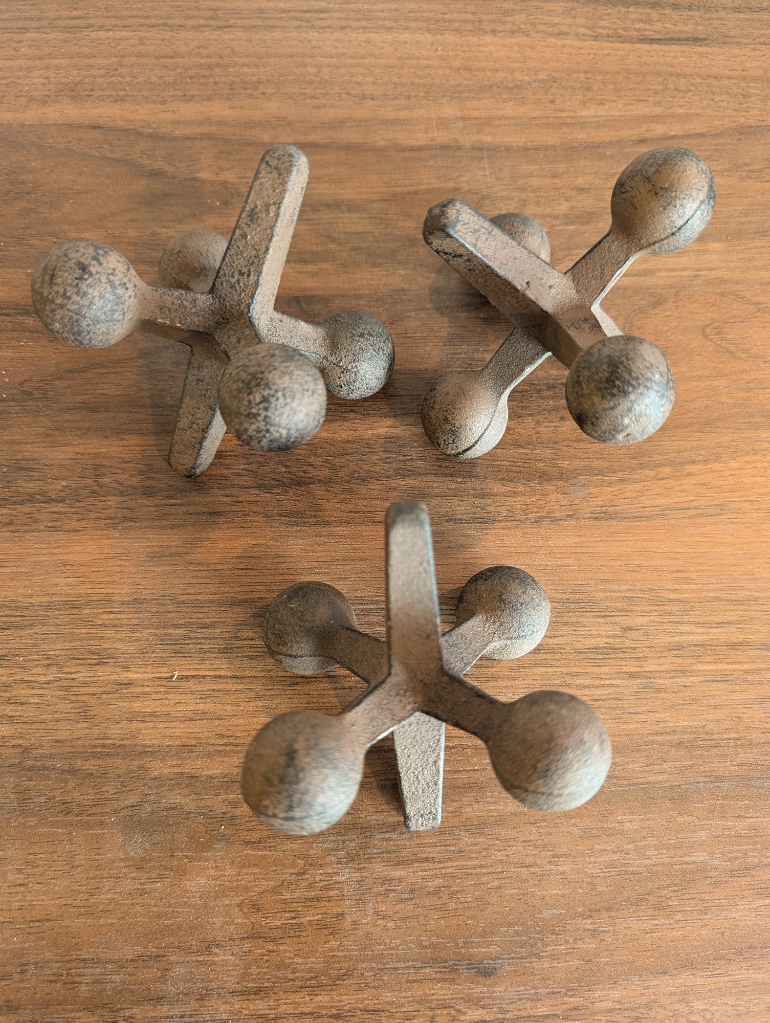 Set of Three Rustic Metal Decorative Jacks