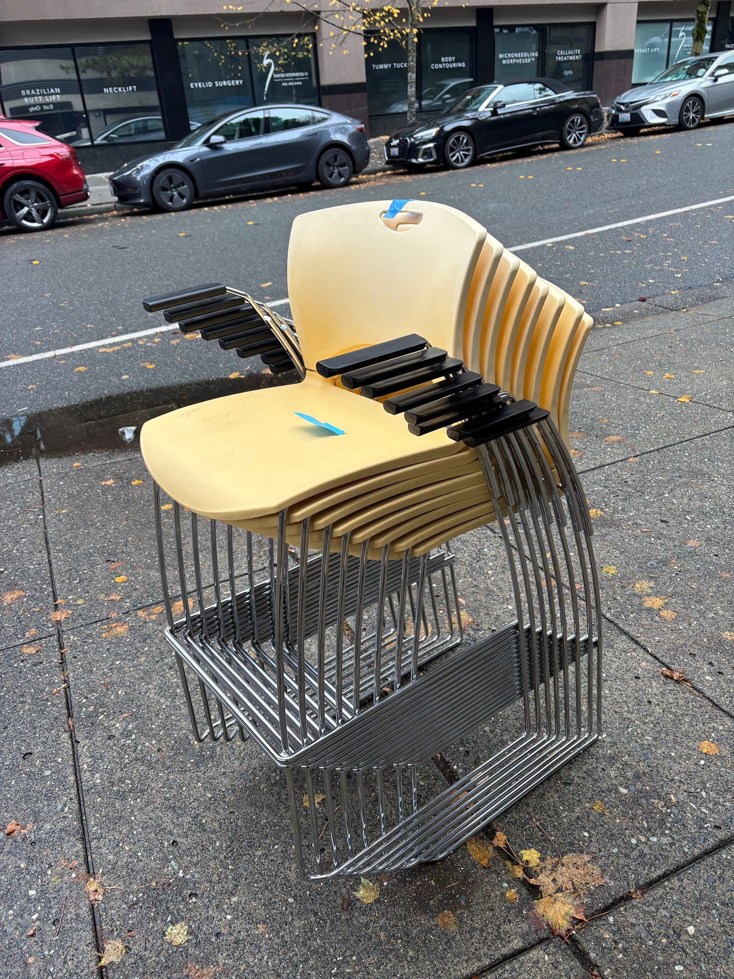 Warehouse sale --- Set of 12 Stackable Yellow Plastic Chairs with Chrome Frames and Armrests