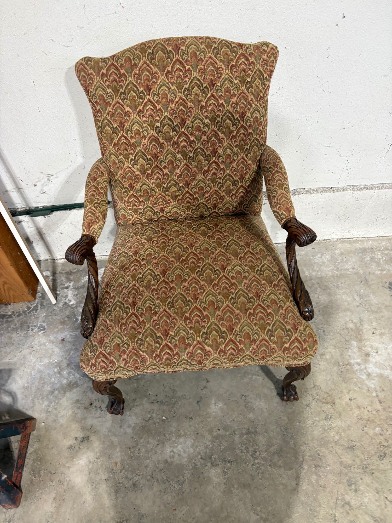 Traditional Upholstered Armchair with Carved Wood Accents