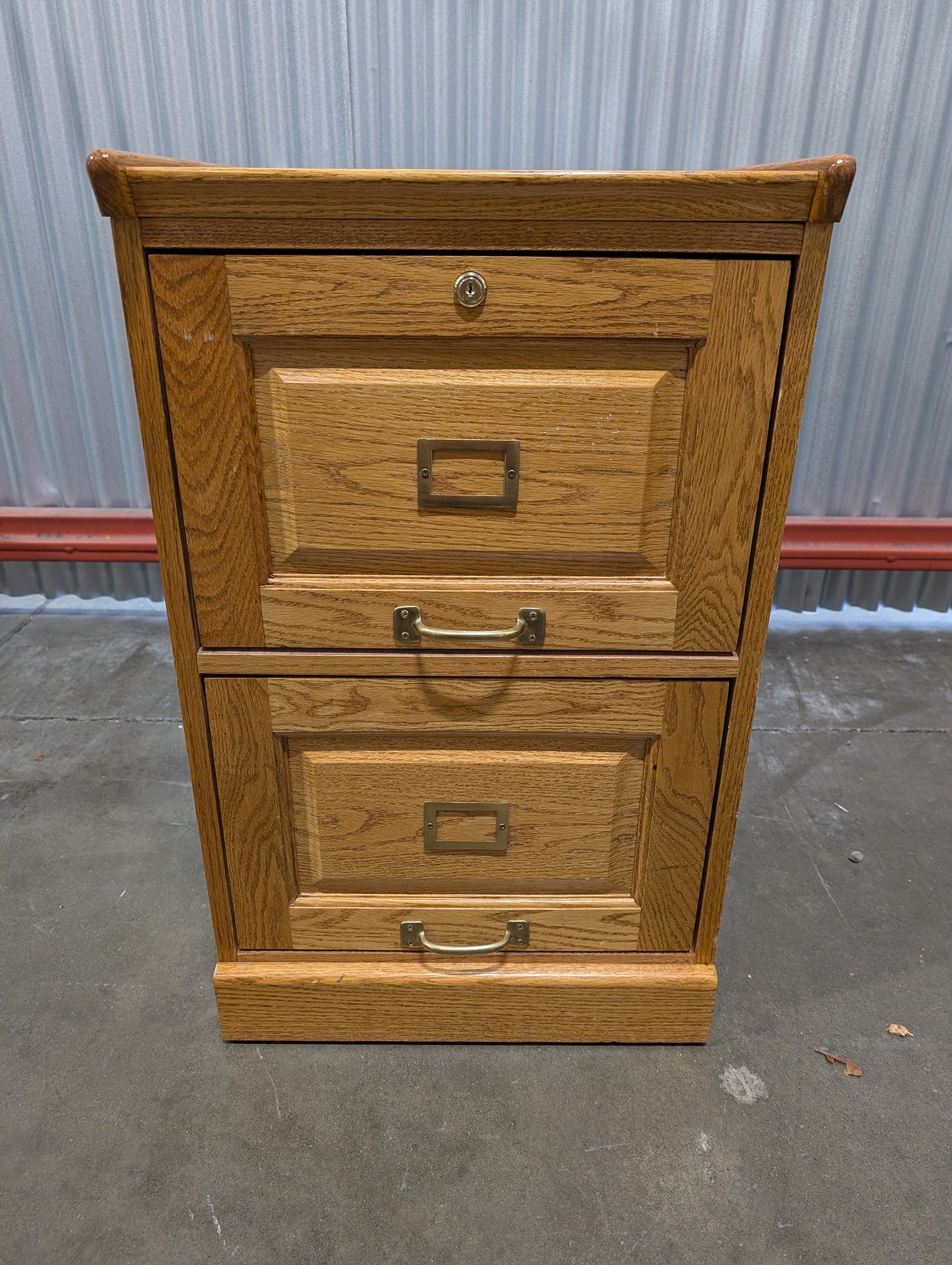 Sturdy Oak Two-Drawer Filing Cabinet with Brass Hardware