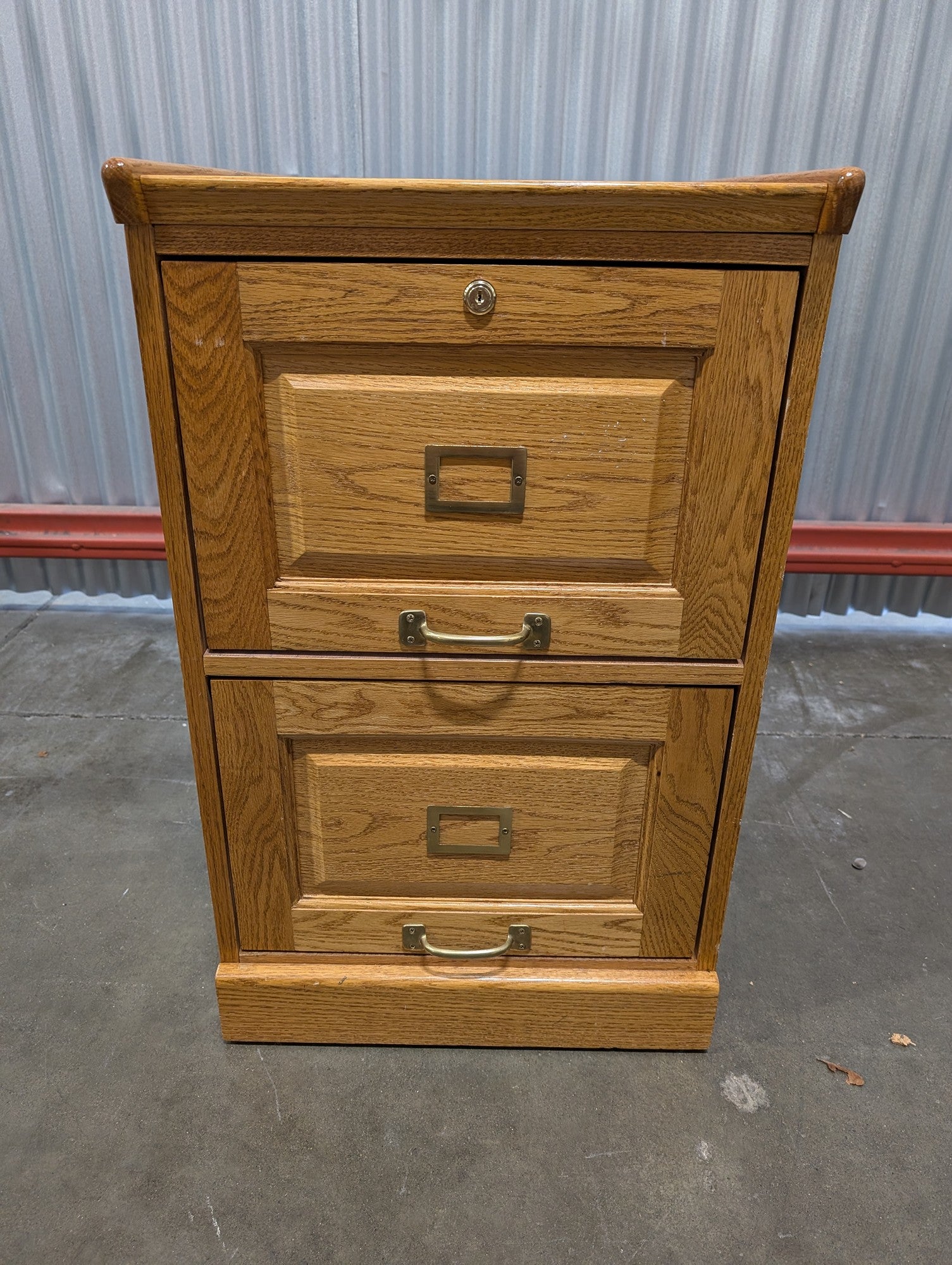 Sturdy Oak Two-Drawer Filing Cabinet with Brass Hardware