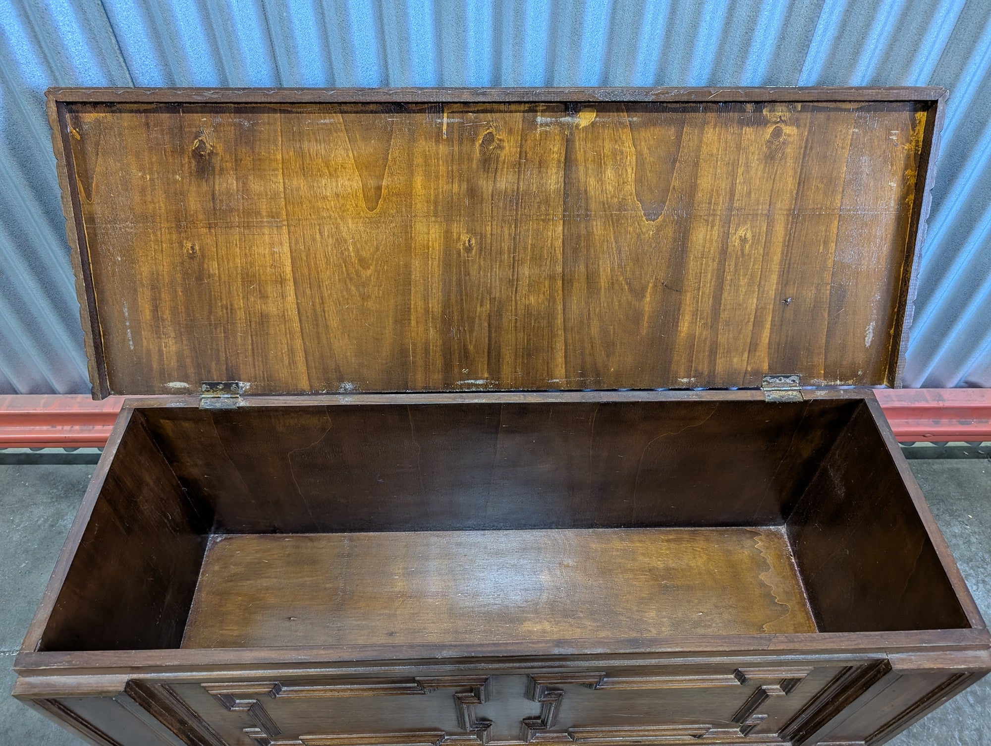 Vintage Dark Wood Storage Chest with Carved Panel Design