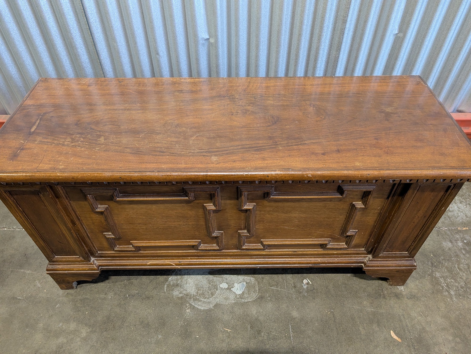 Vintage Dark Wood Storage Chest with Carved Panel Design