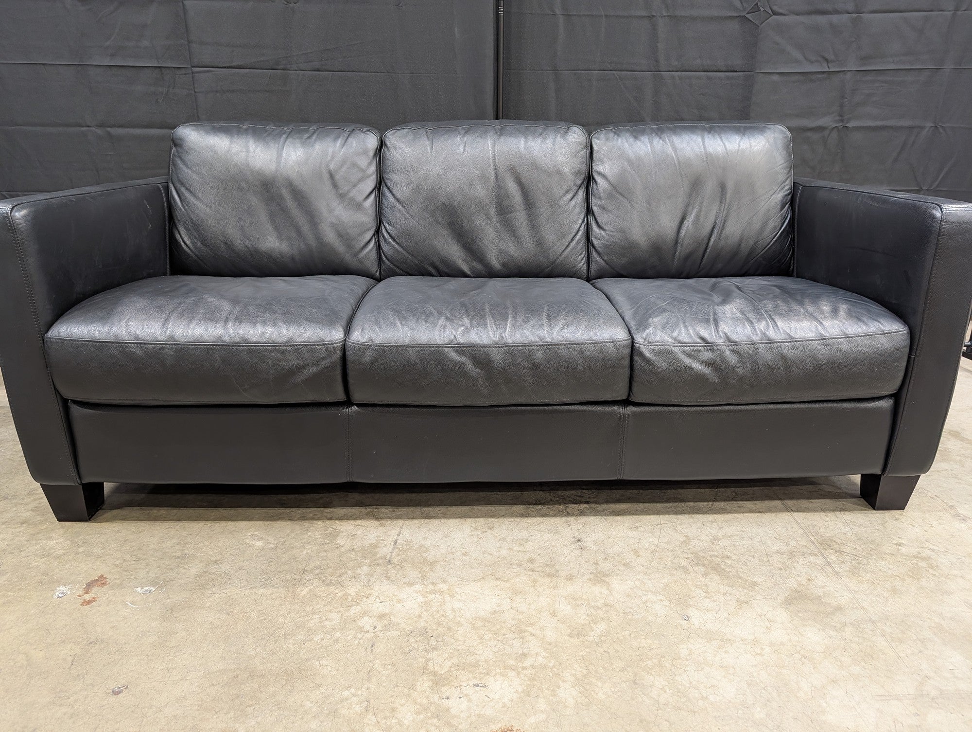 Modern Black Leather Three-Seater Sofa