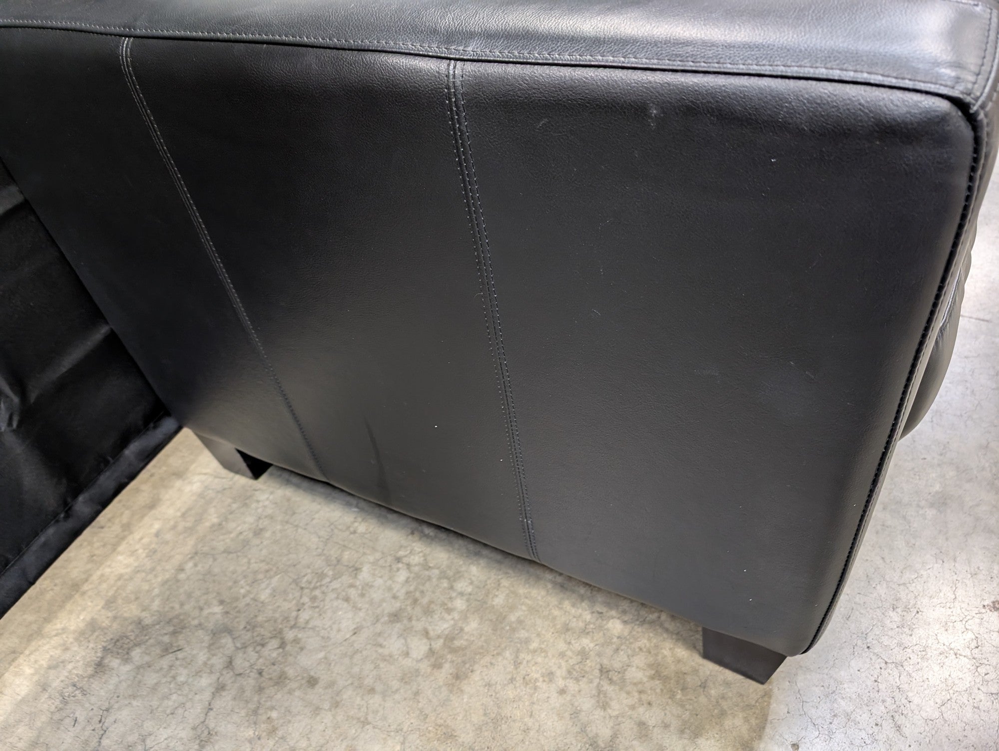 Modern Black Leather Three-Seater Sofa