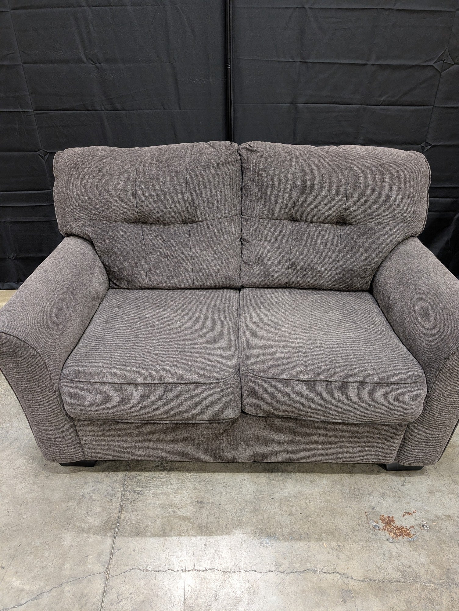 Compact Grey Textured Fabric Loveseat with Accent Pillows