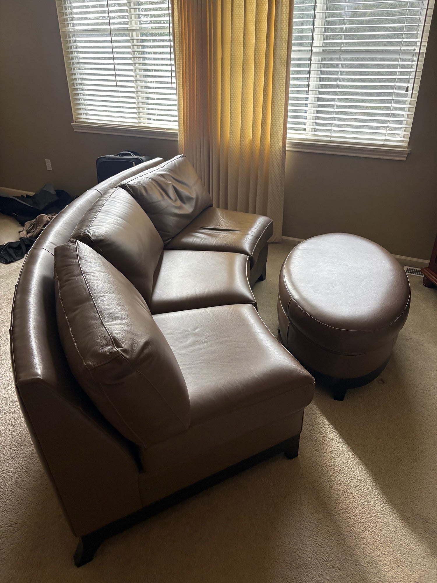 Contemporary Brown Leather Curved Sectional Sofa with Matching Round Ottoman