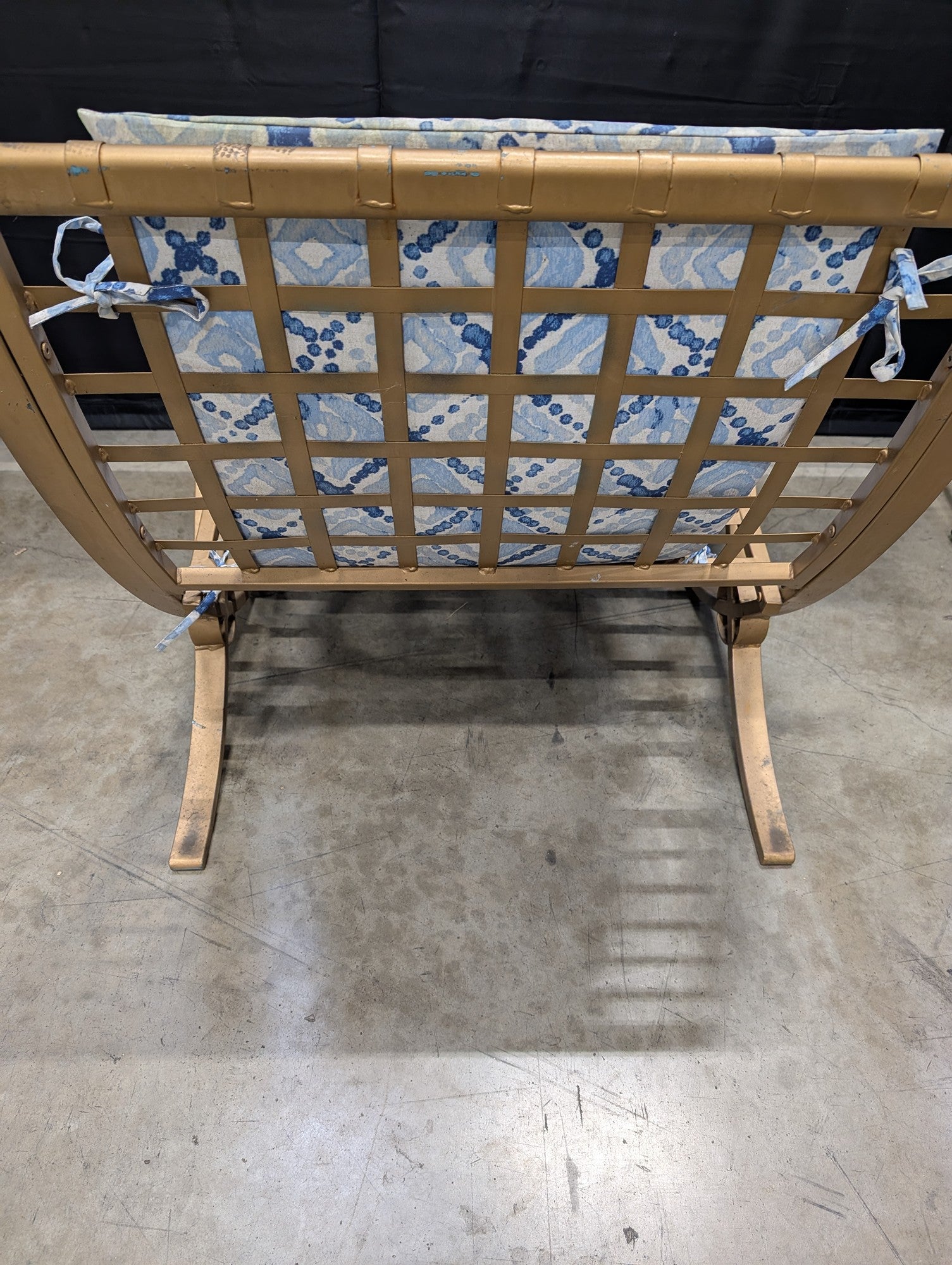 Outdoor Metal Chaise Lounge with Blue Ikat Patterned Cushion