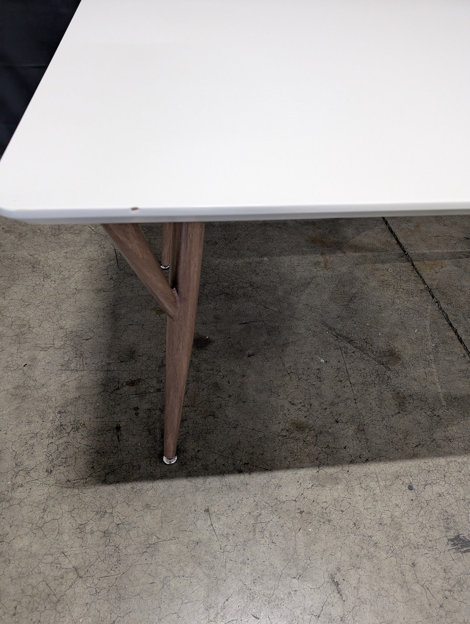 Modern RectangularTable with White Top and Tapered Wood Legs