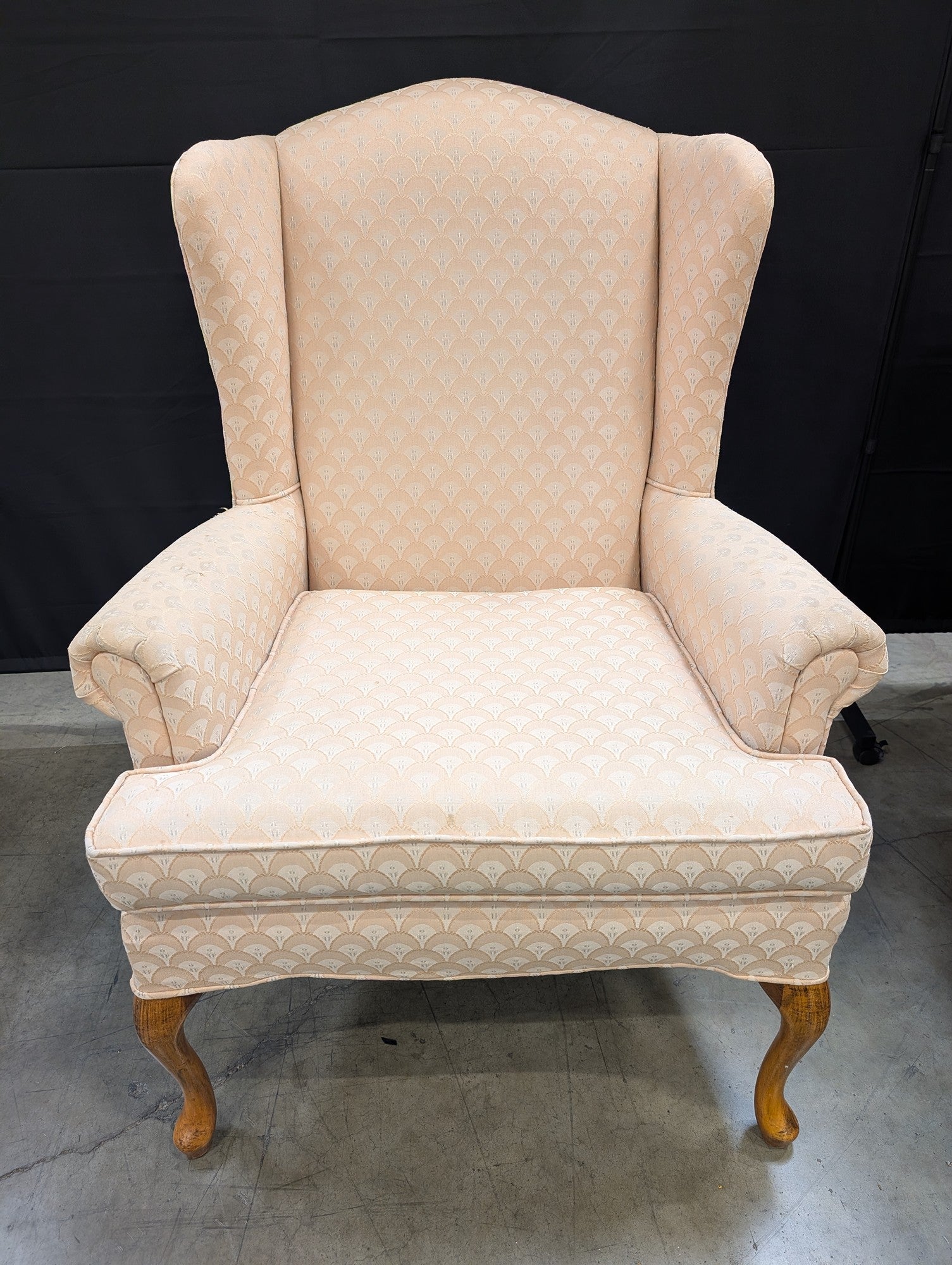 Traditional Upholstered Wingback Armchair with Scalloped Pattern