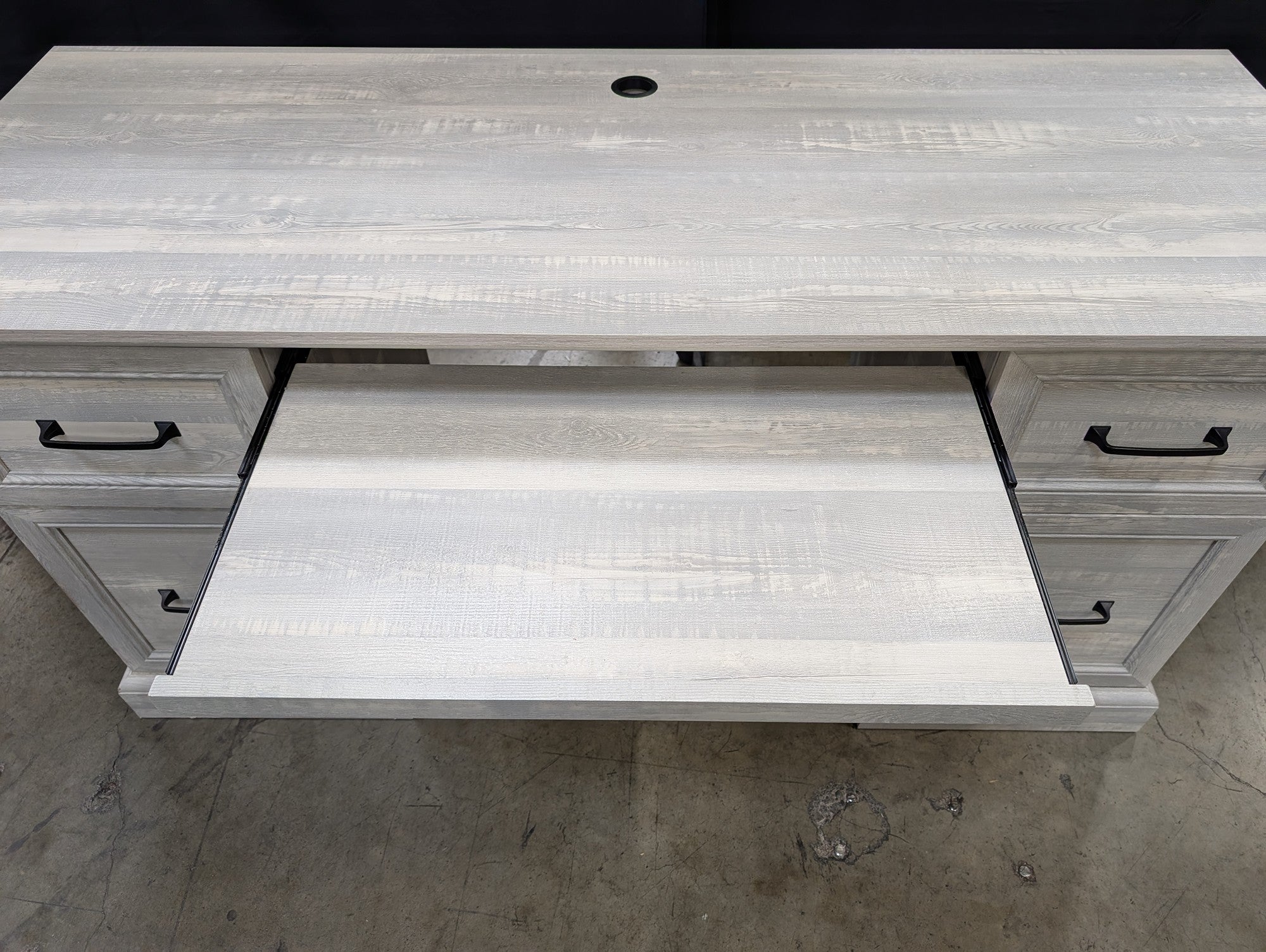 Light Gray Wood Grain Office Desk with Multiple Drawers