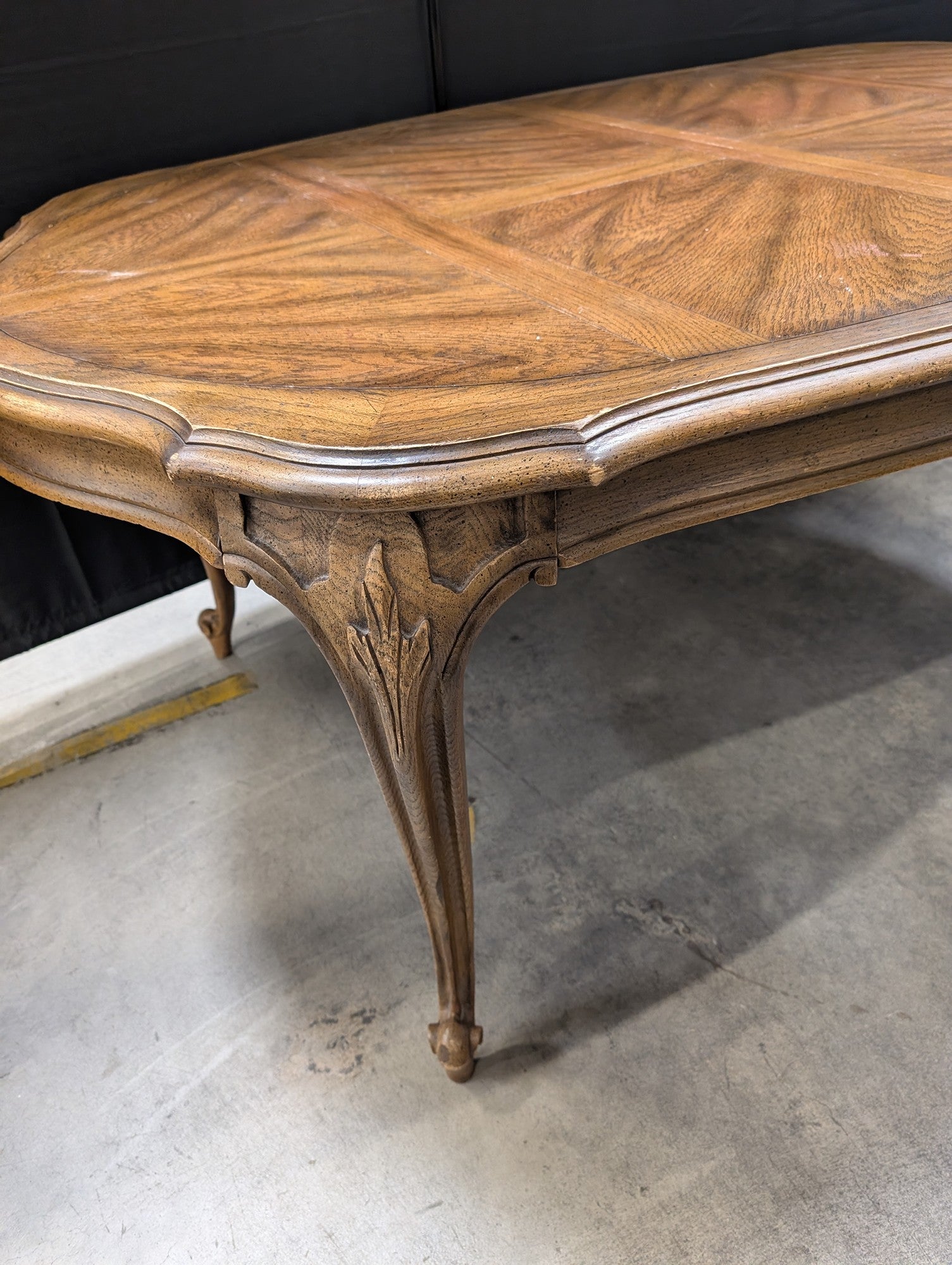 Ornate Oval Wood Dining Table with Inlaid Top