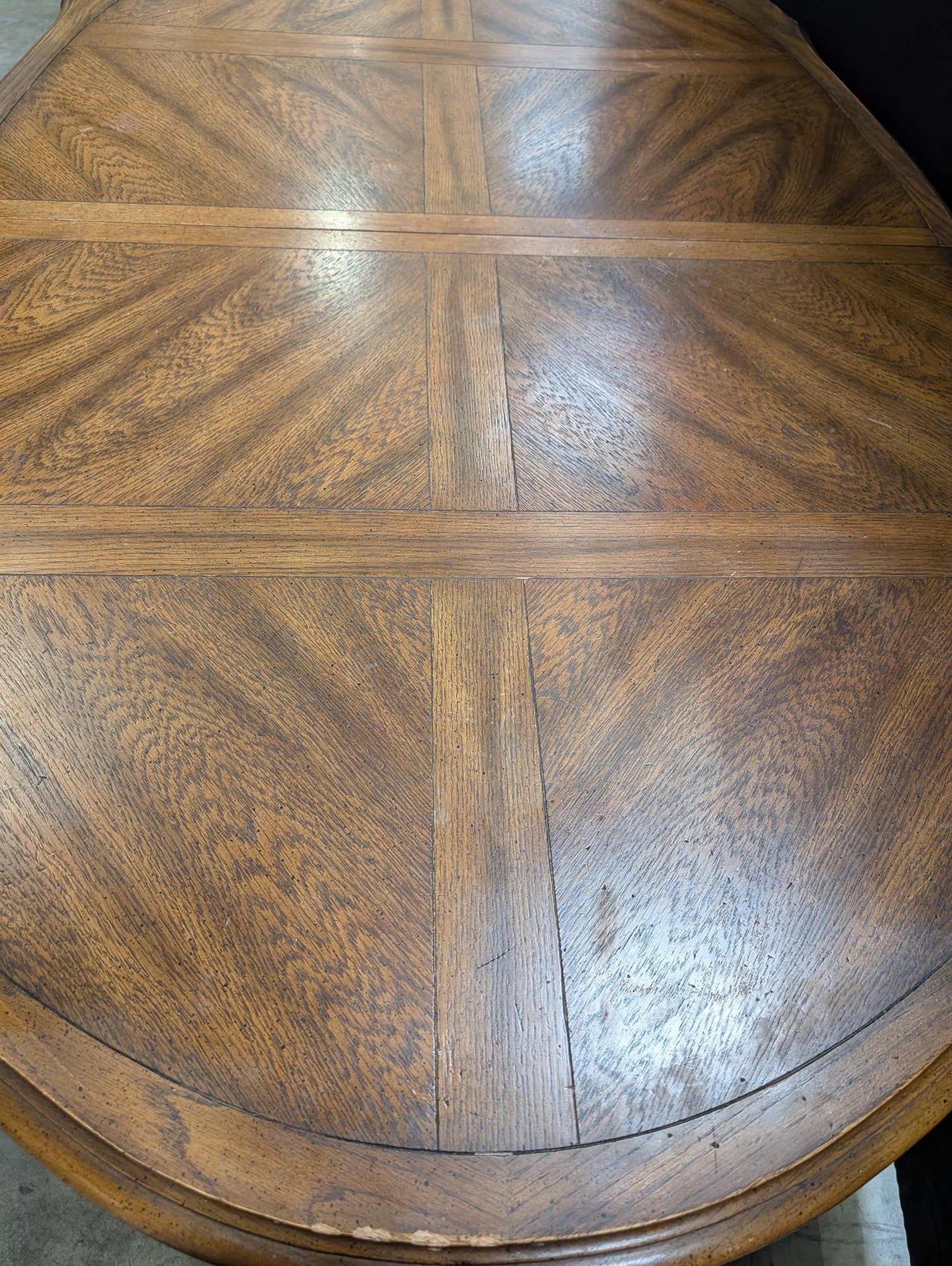 Ornate Oval Wood Dining Table with Inlaid Top