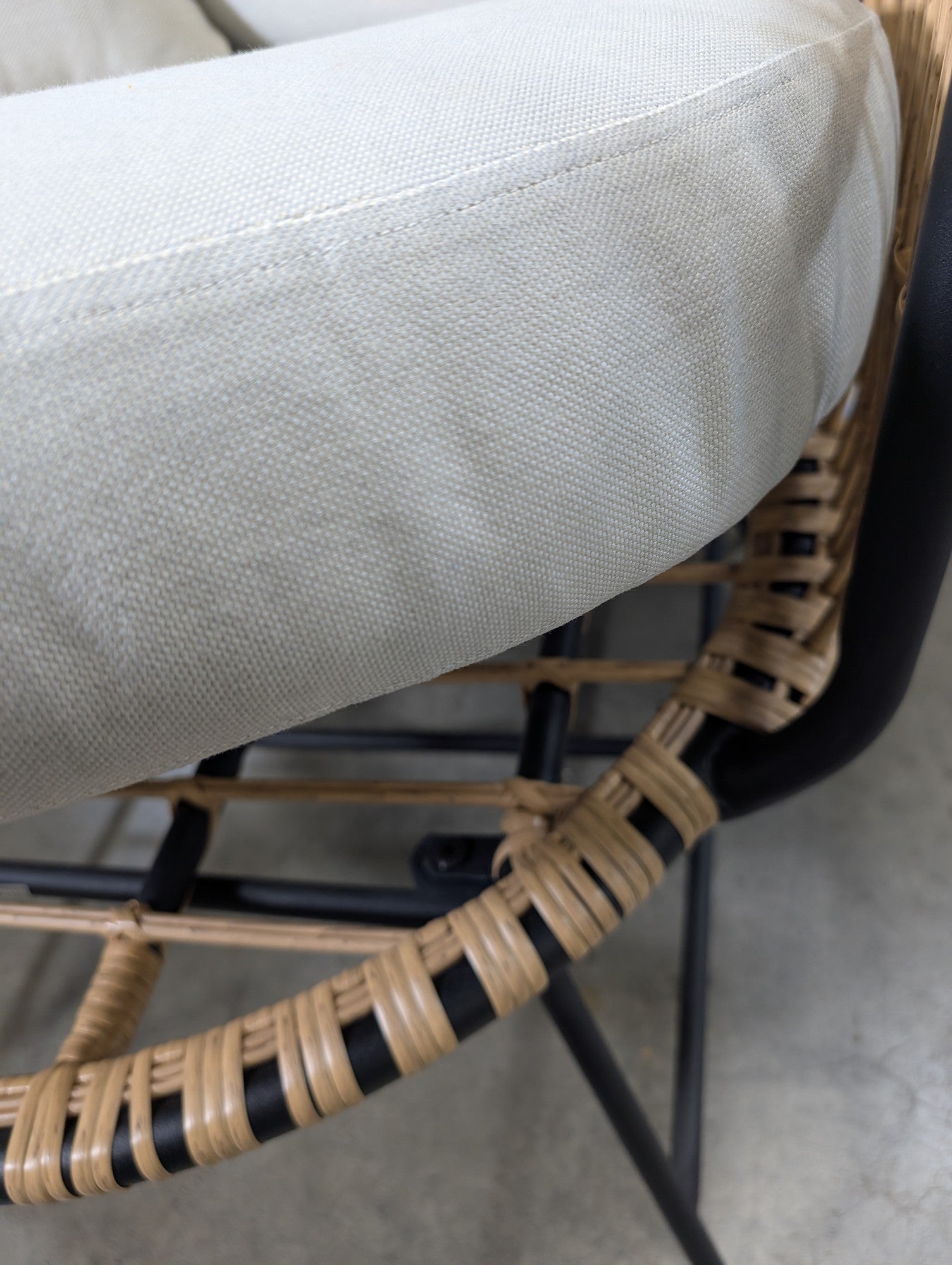 Modern Rattan Woven Lounge Chair with Cream Cushions
