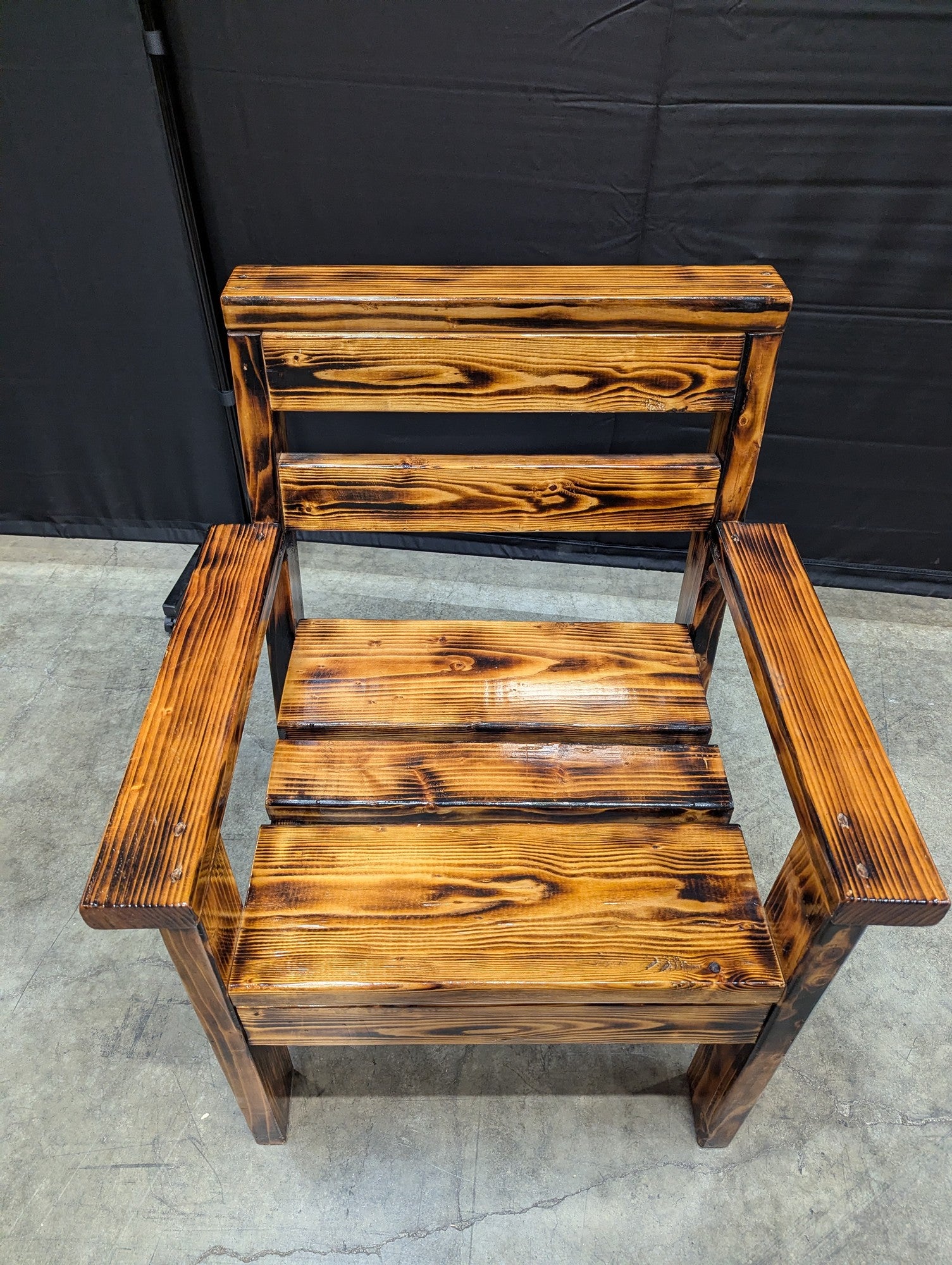 Rustic Torched Wood Outdoor Armchair
