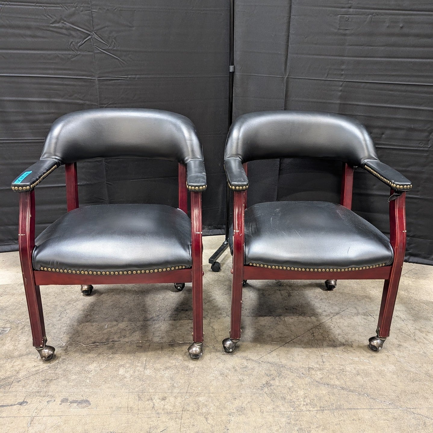 Traditional Black Upholstered Armchair with Dark Wood Frames