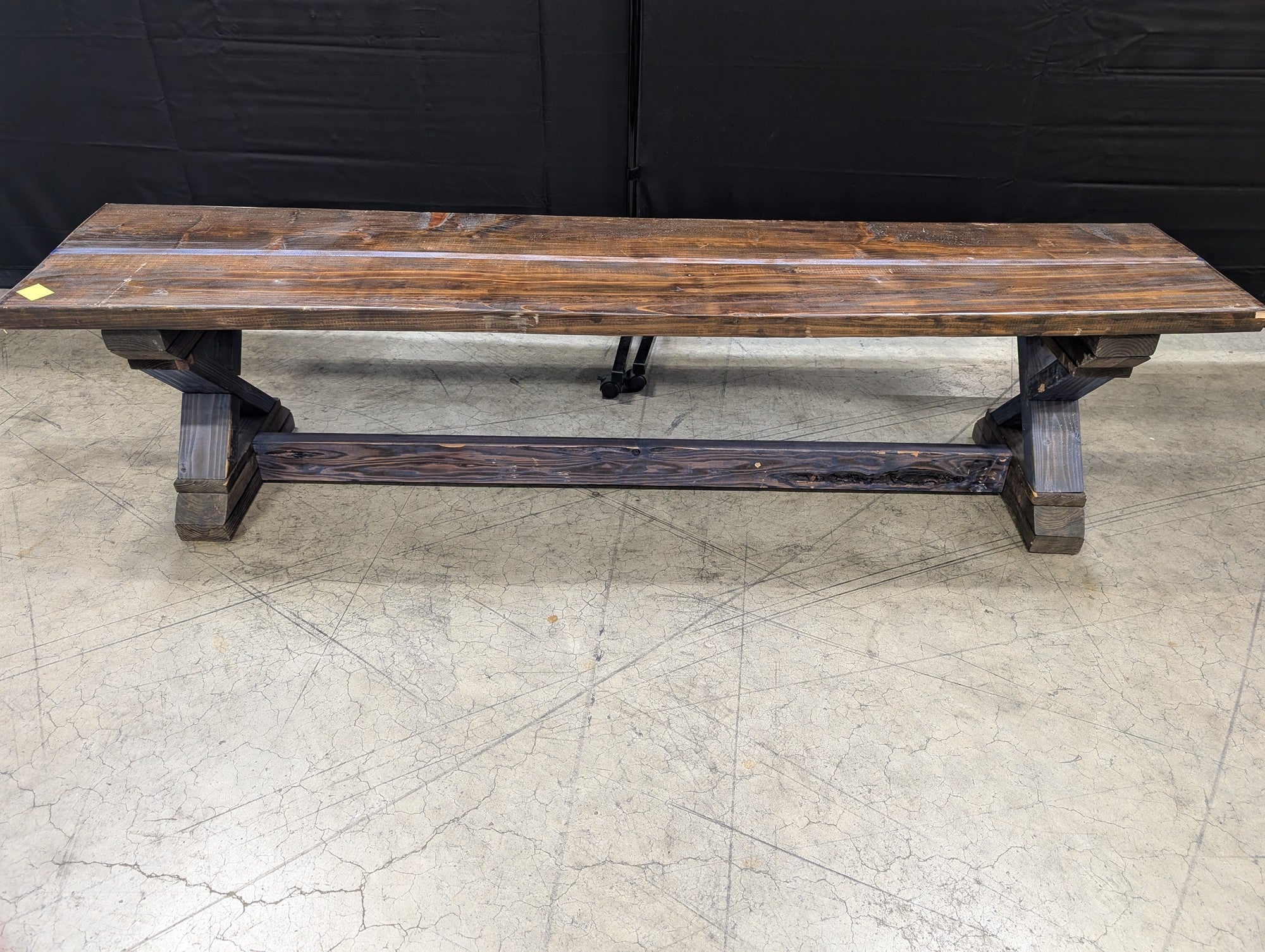 Sturdy Dark Stained Wood Trestle Bench