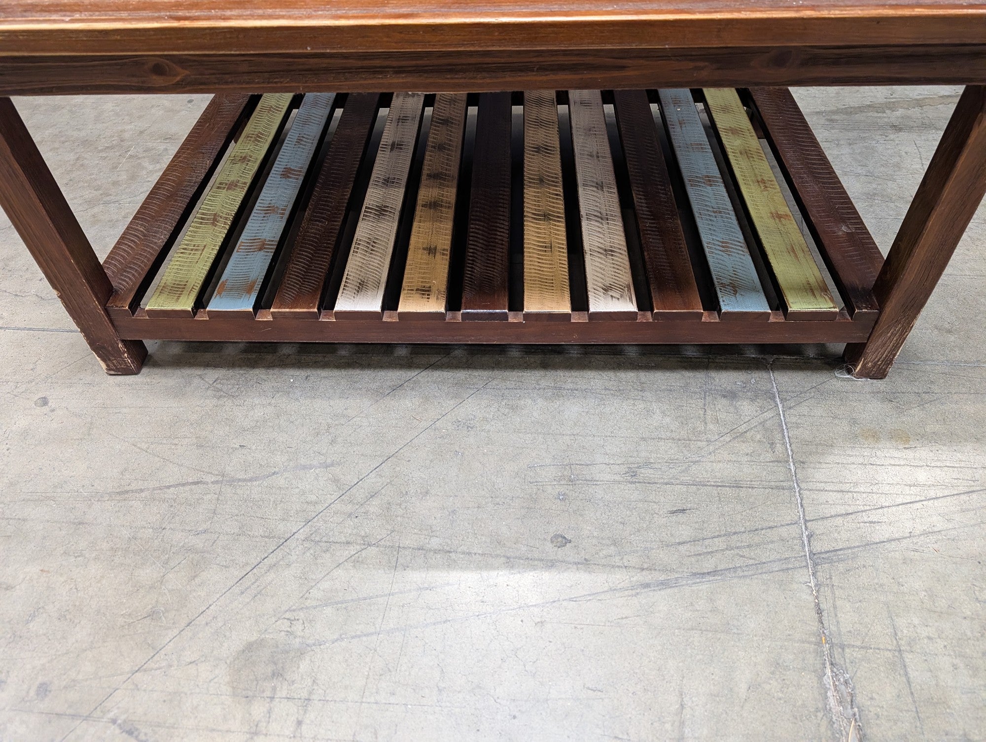 Rustic Wood Coffee Table with Multi-Color Slatted Shelf